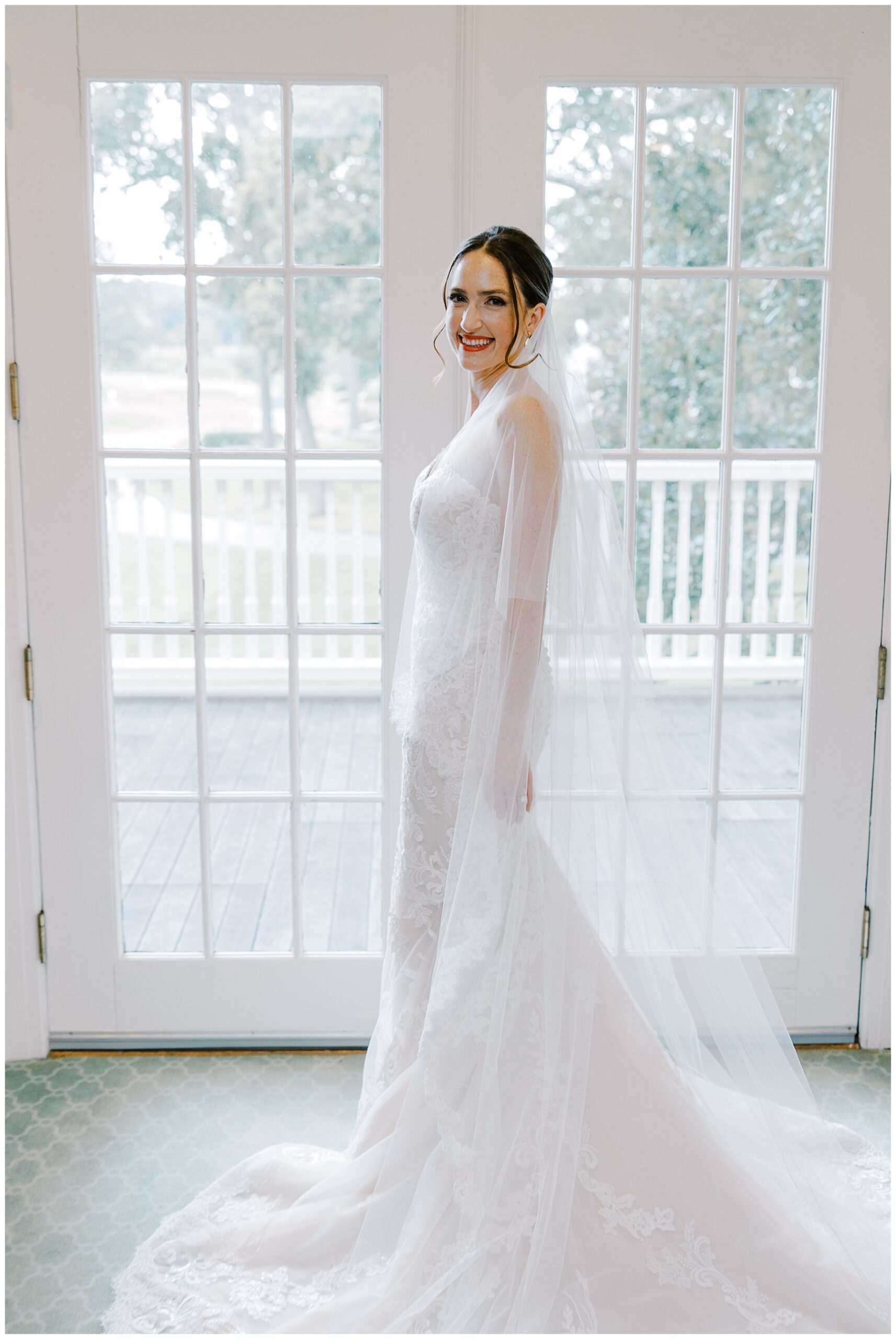 bride in wedding dress before romantic floral centered wedding at The Country Club in Brookline, MA