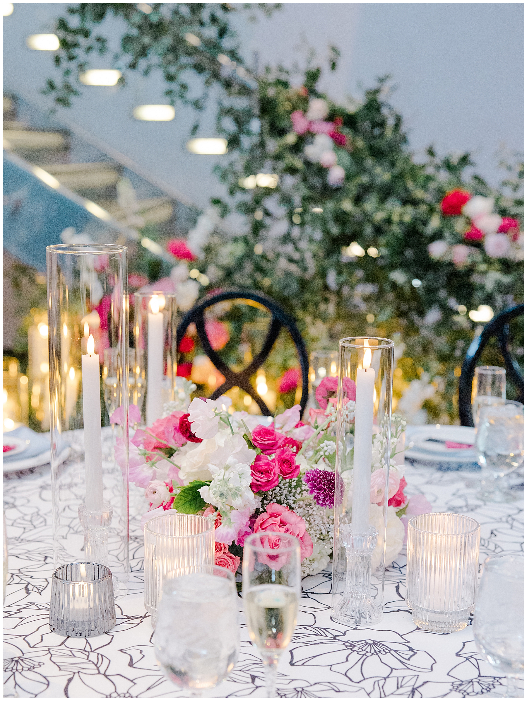 Pink floral centerpieces from Elegant State Room Wedding