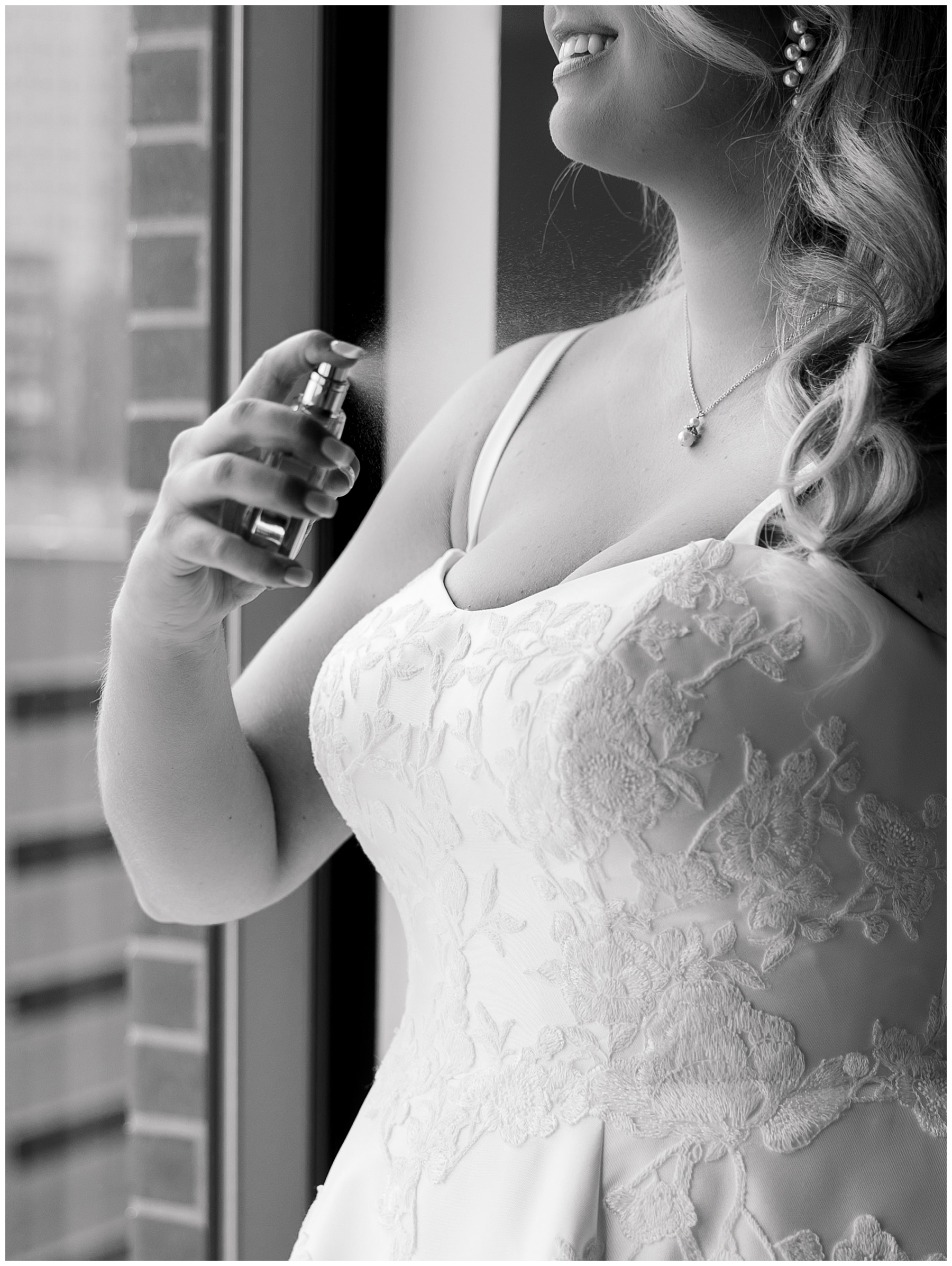 bride spraying perfume
