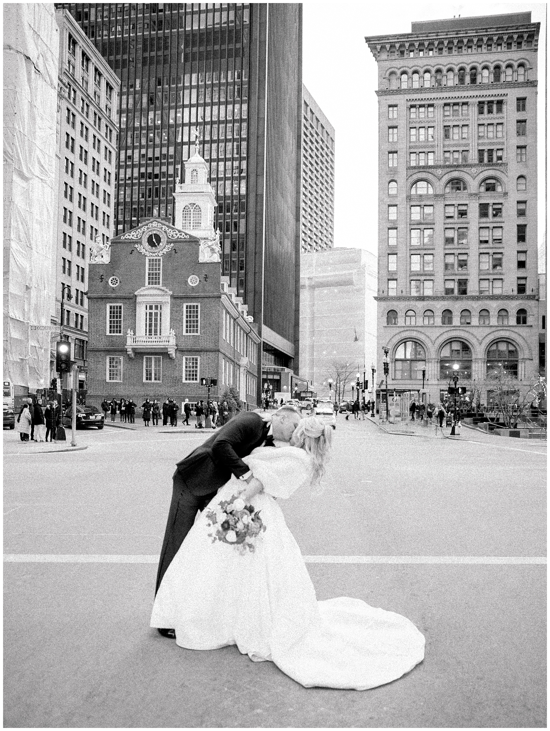 timeless wedding portraits in Boston with epic kiss