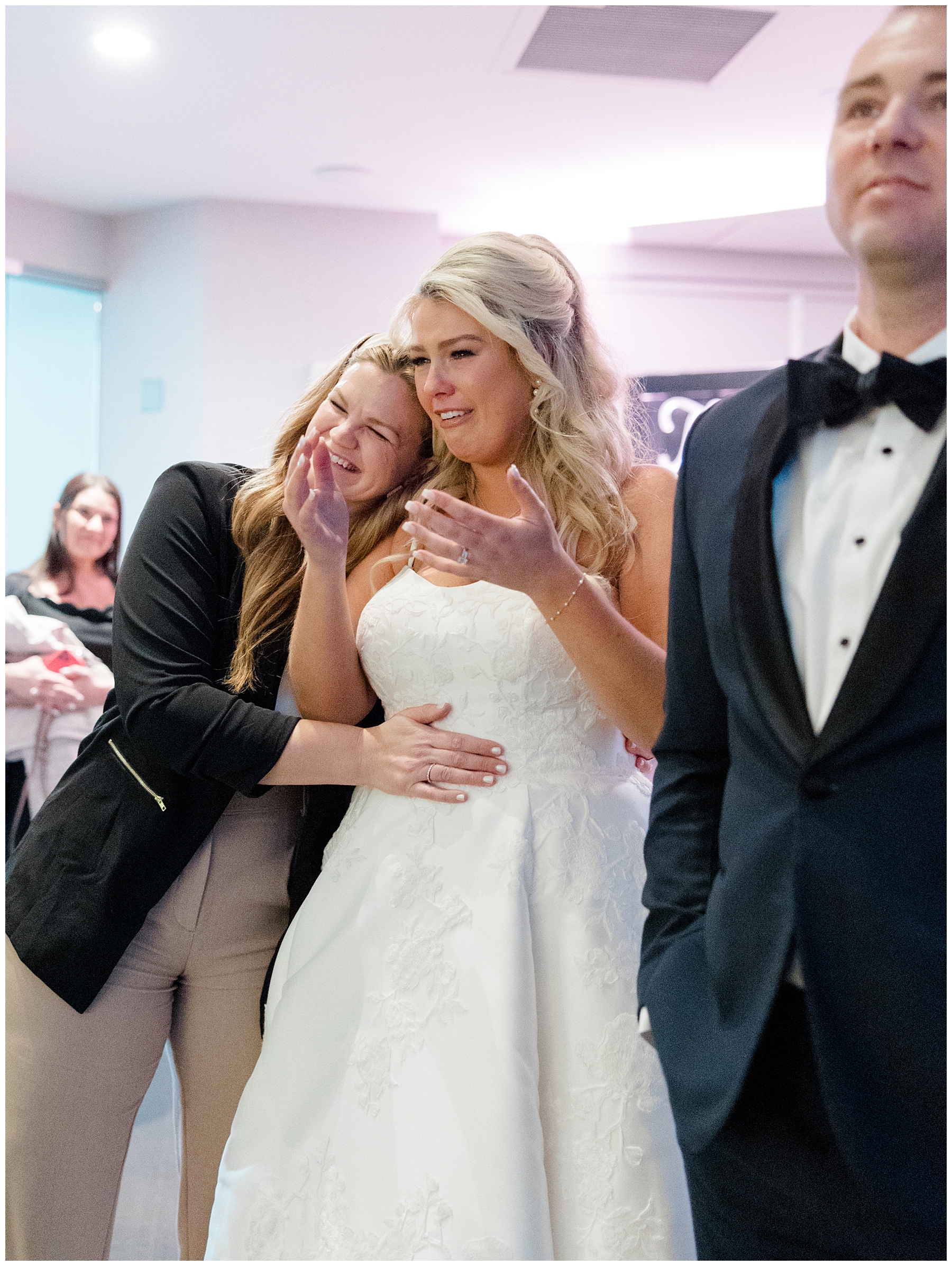bride reacts to seeing wedding reception details and decor
