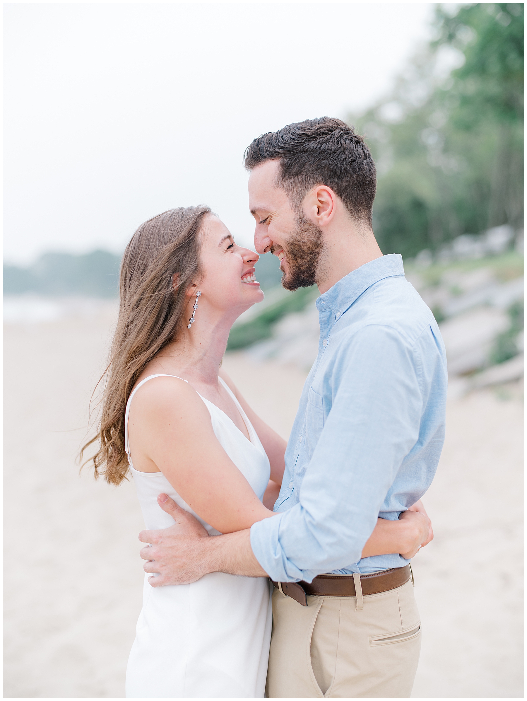 candid engagement photos in Boston at North Shore Beach