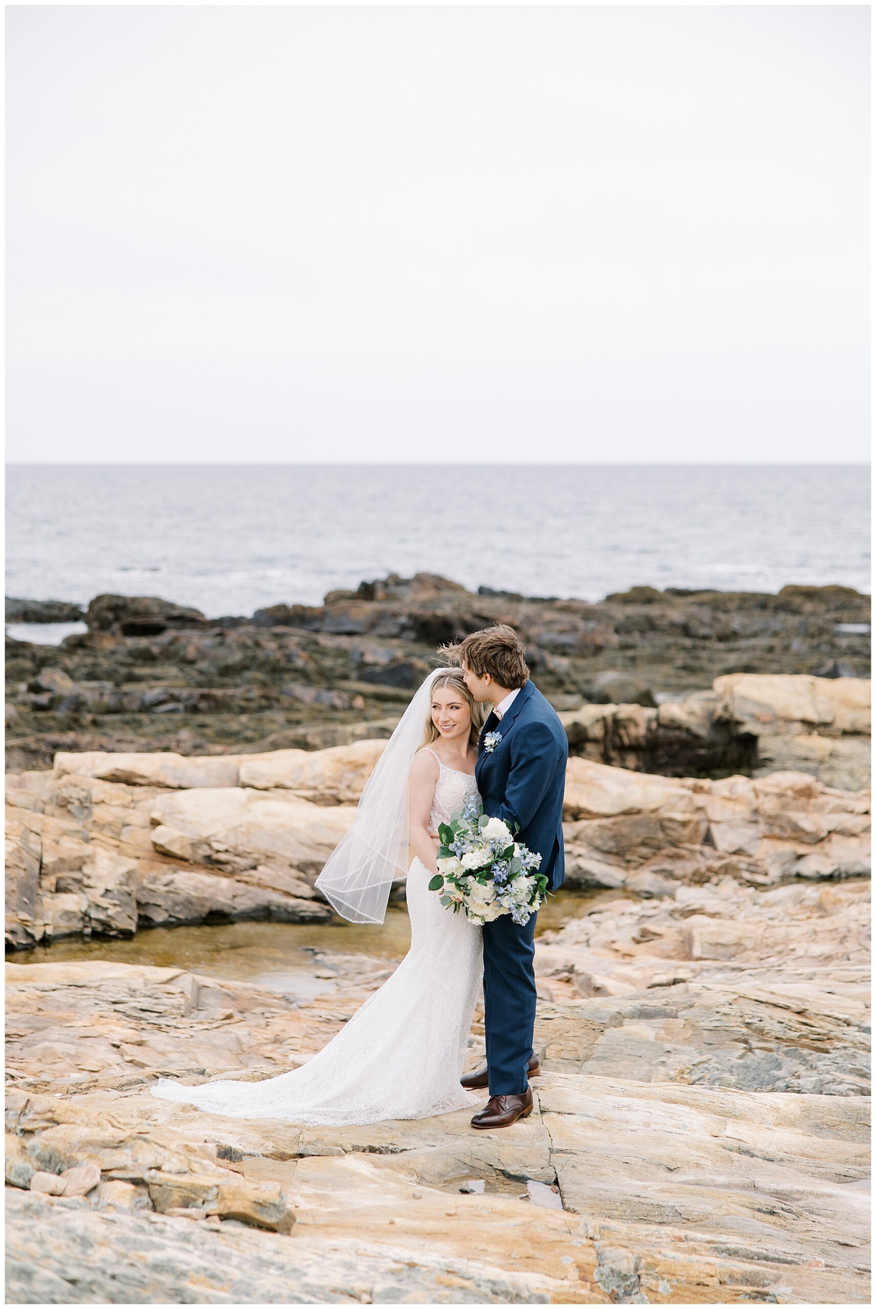 romantic wedding photos on the rocky coastline 