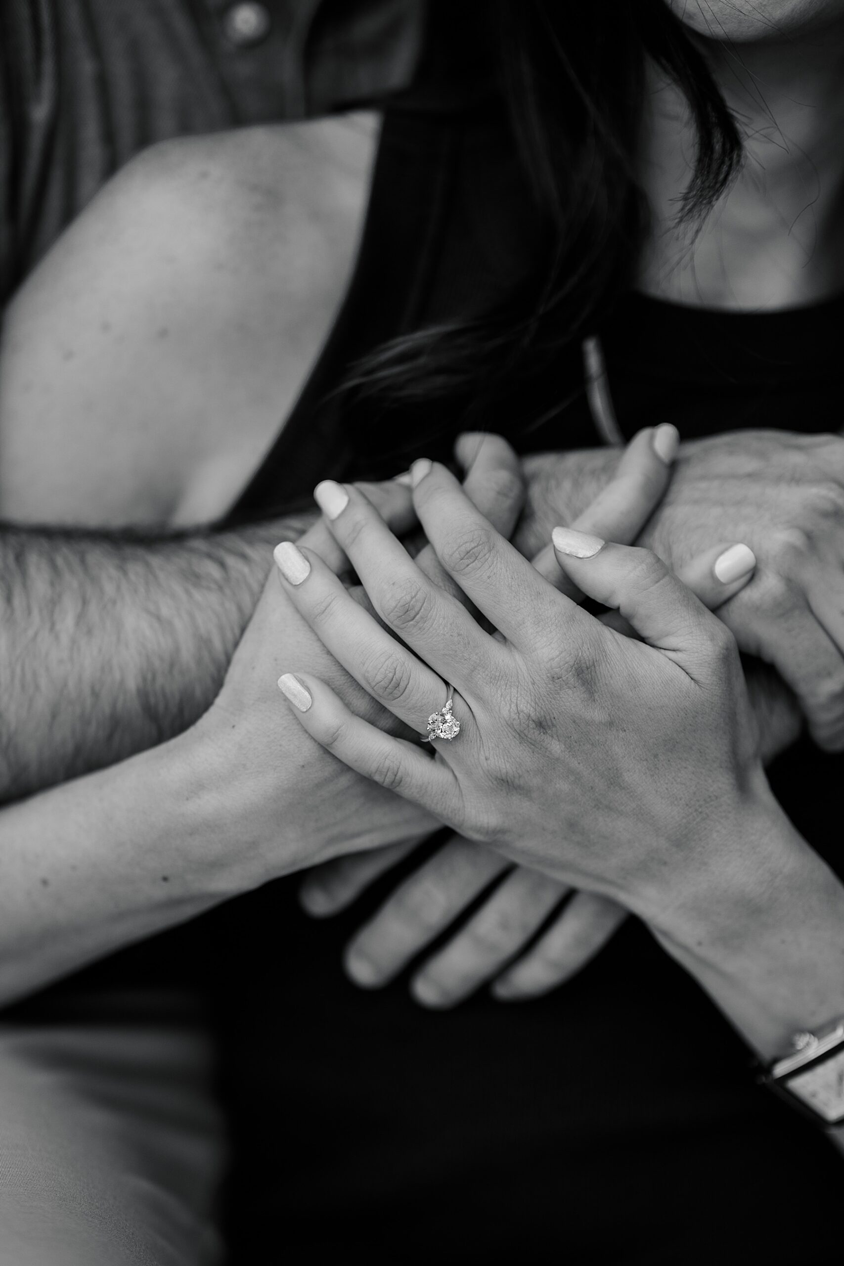 classic portrait of couple with the engagement ring