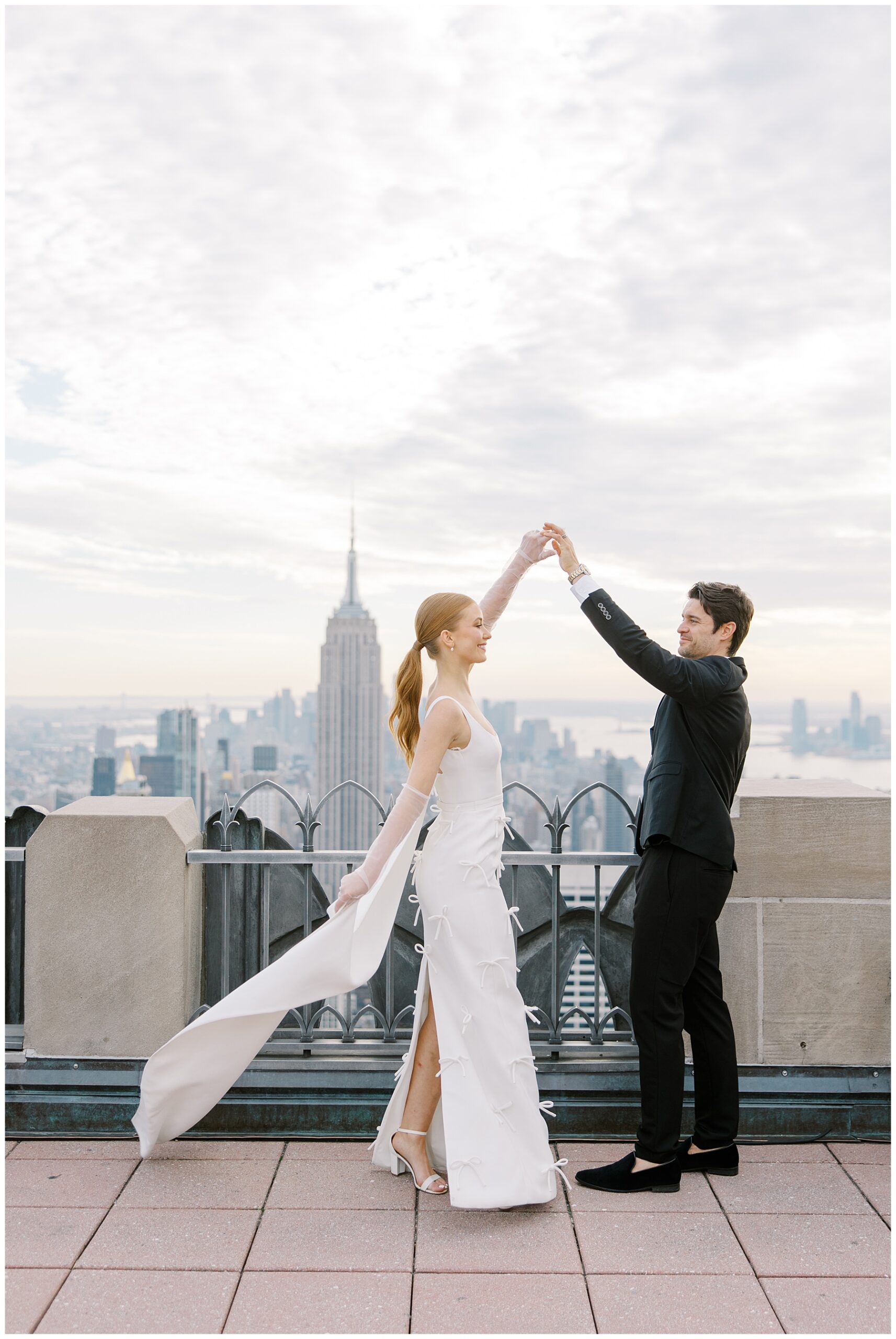 newlyweds dance on rooftop in NYC