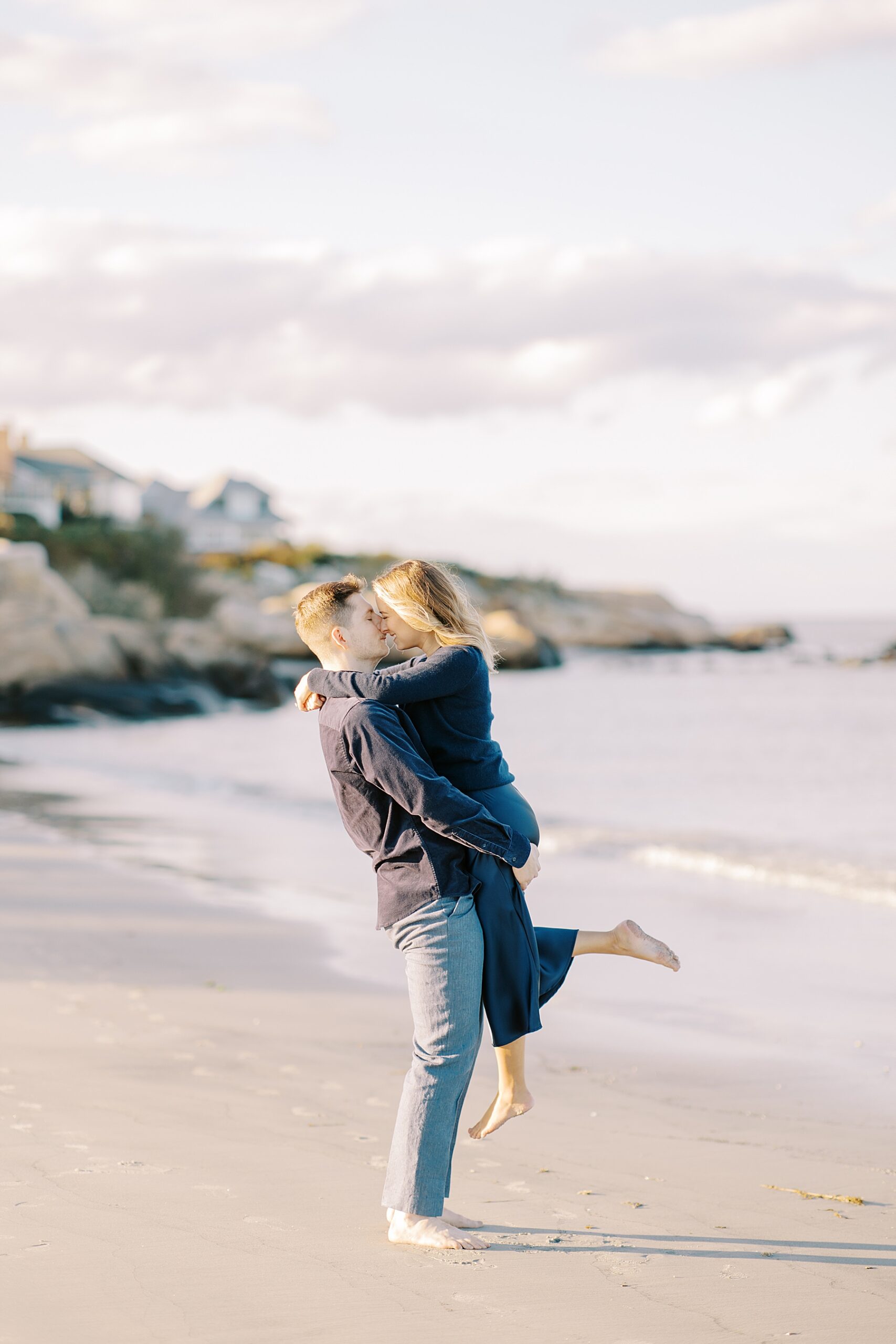 candid engagement photos at Wingaersheek Beach