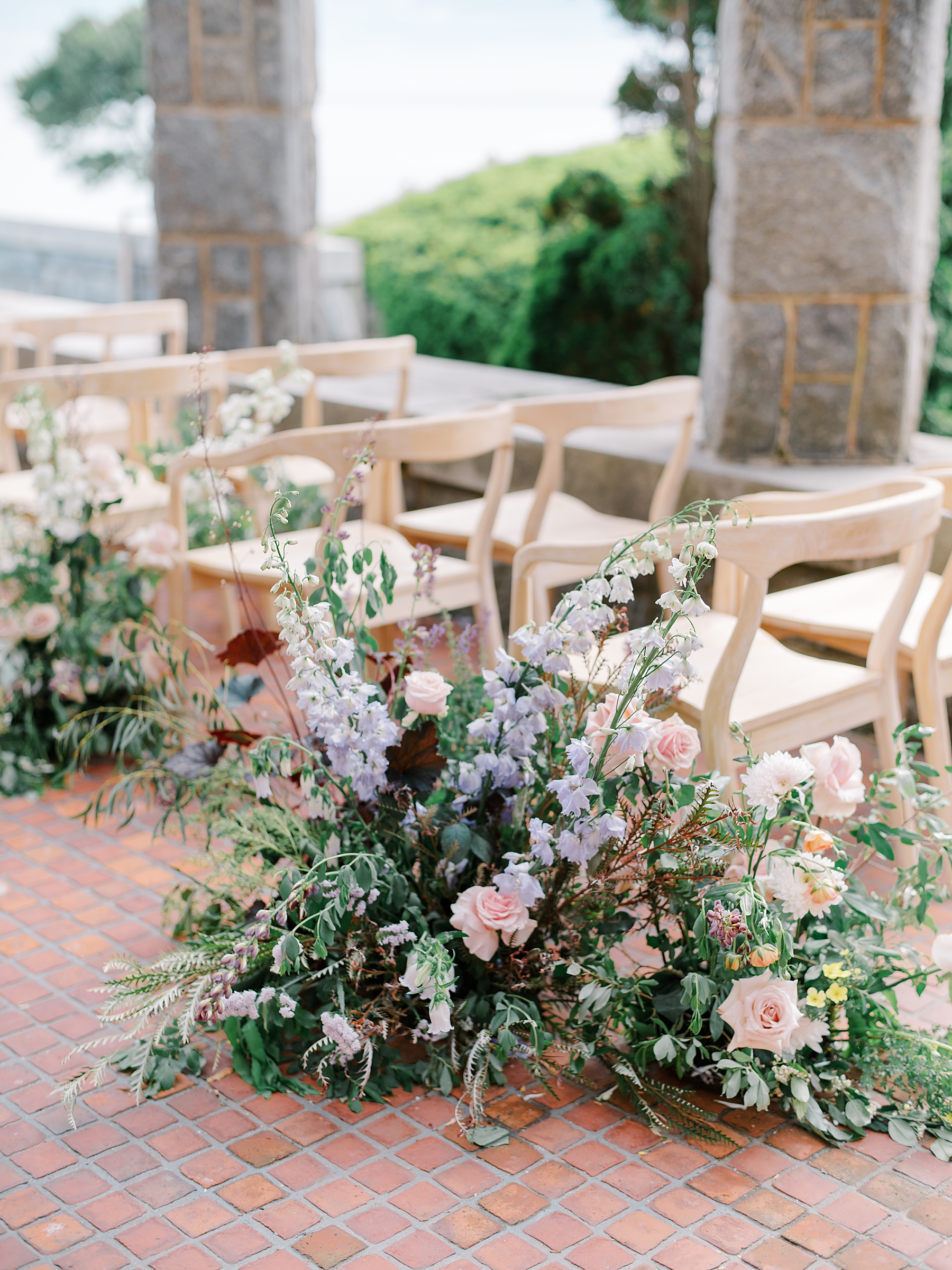 light purple and pink flower arrangements at wedding ceremony in Connecticut