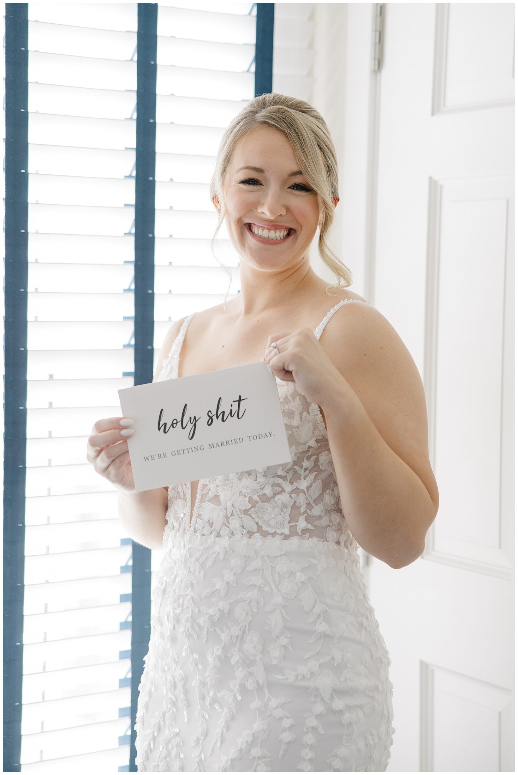 bride holding card