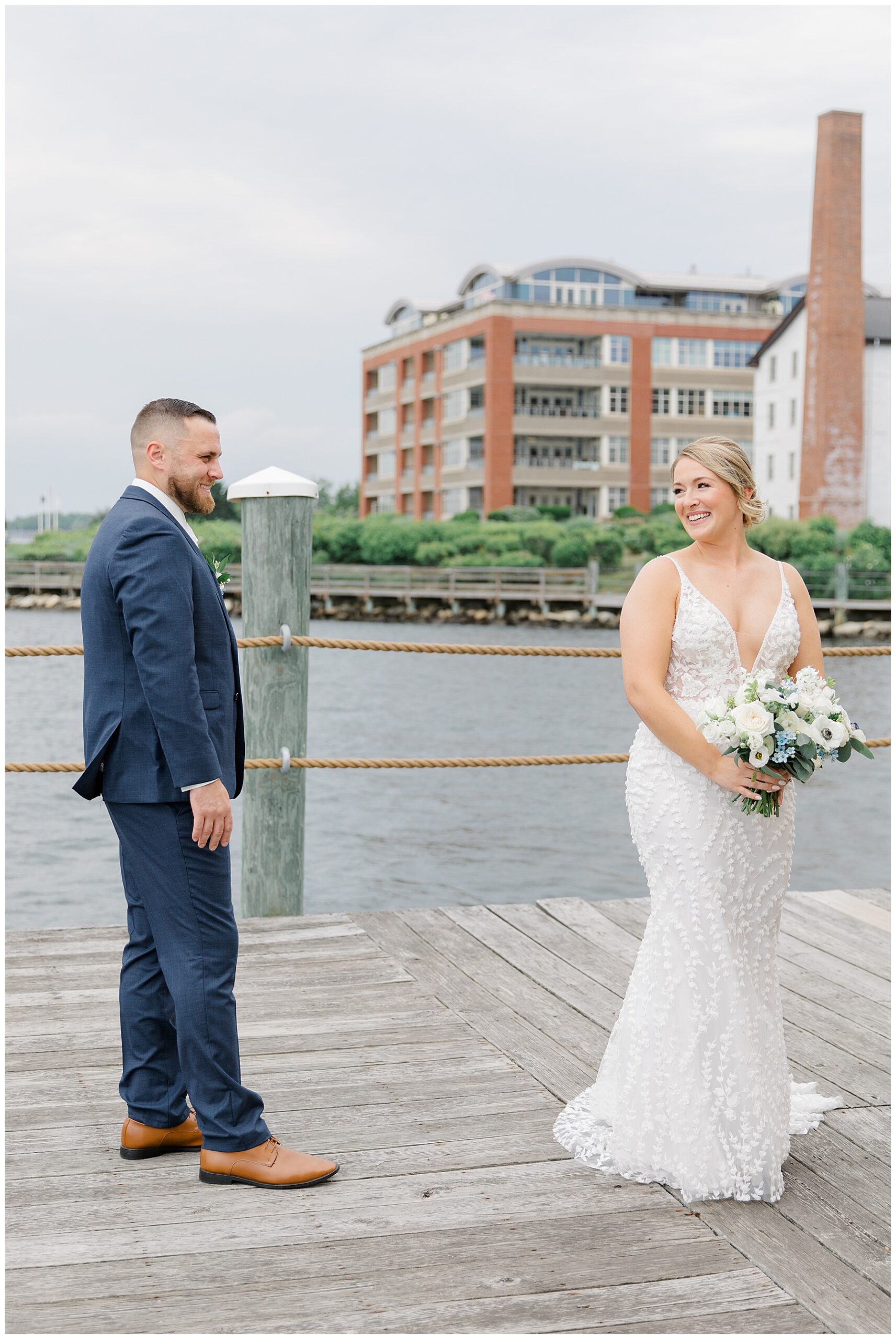 first look moment before Bristol Harbor Inn Coastal Wedding