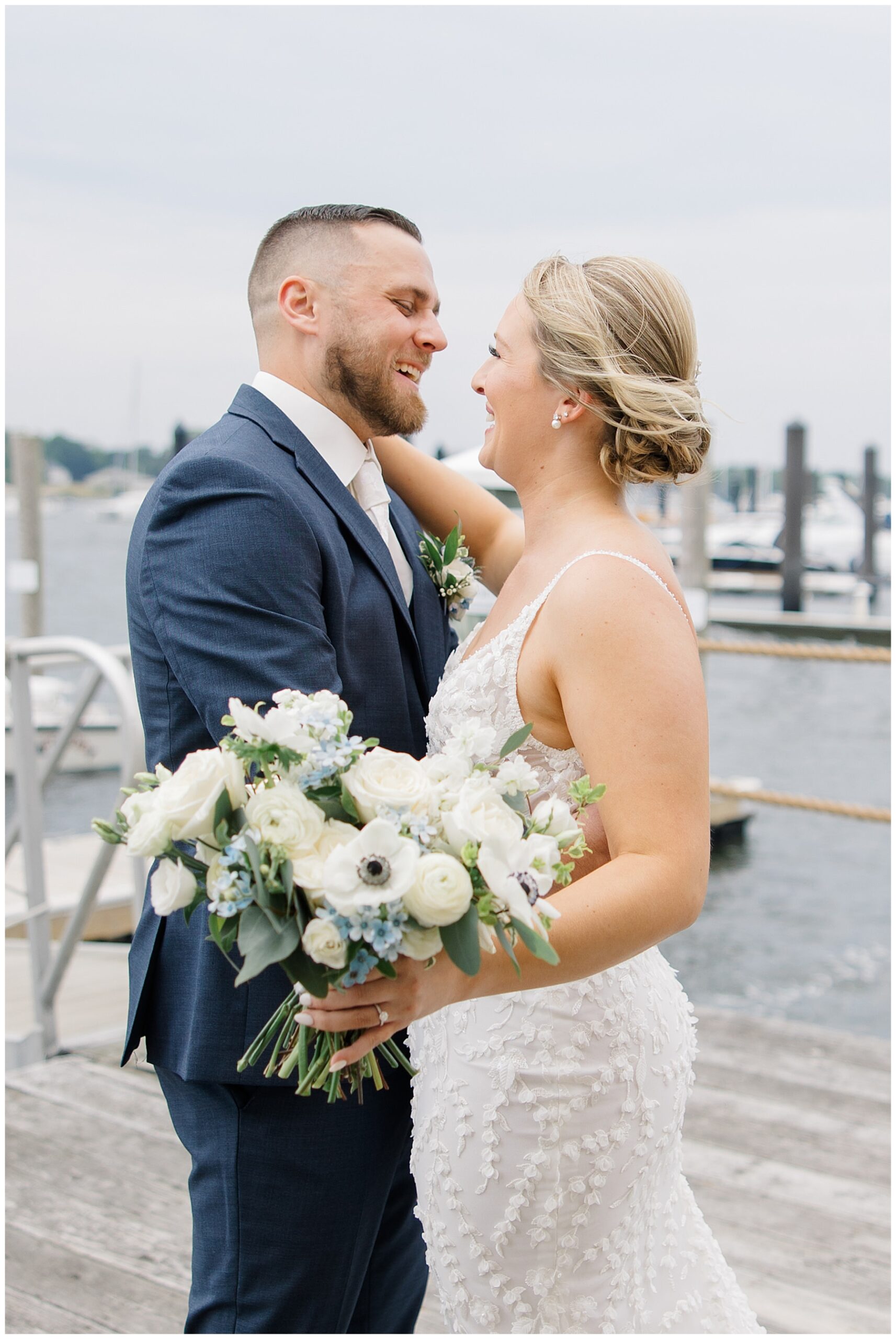 bride and groom photos by the water 