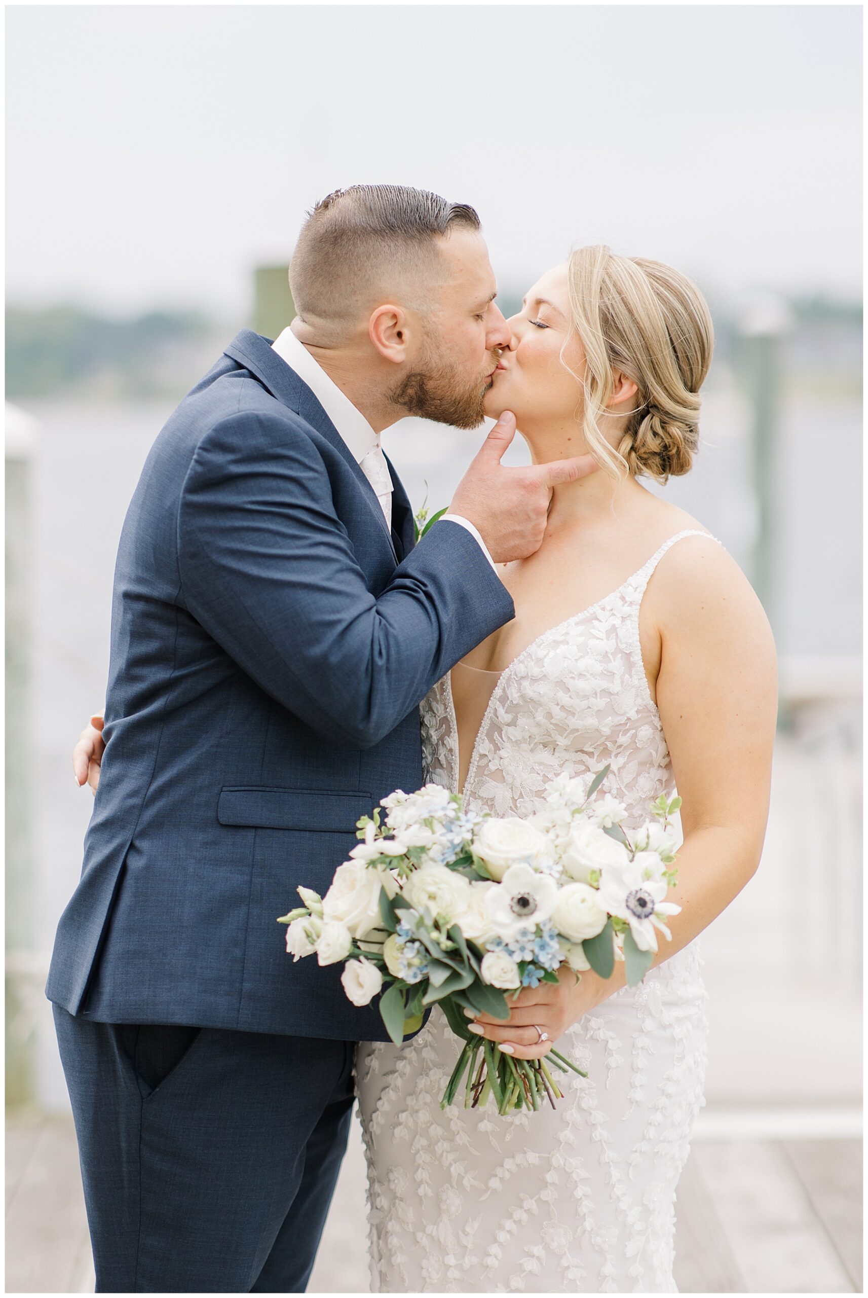 groom kisses his bride