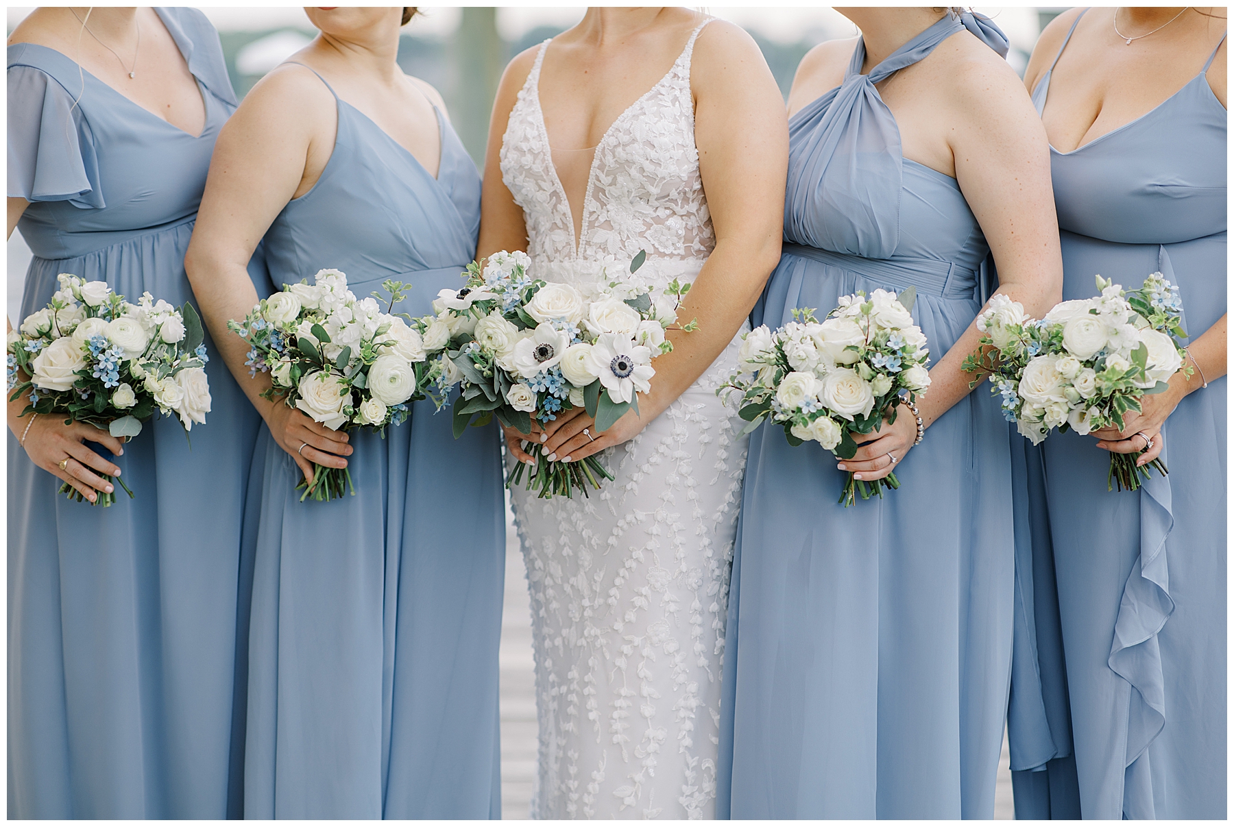 blue bridesmaids dresses and white flower wedding bouquets 