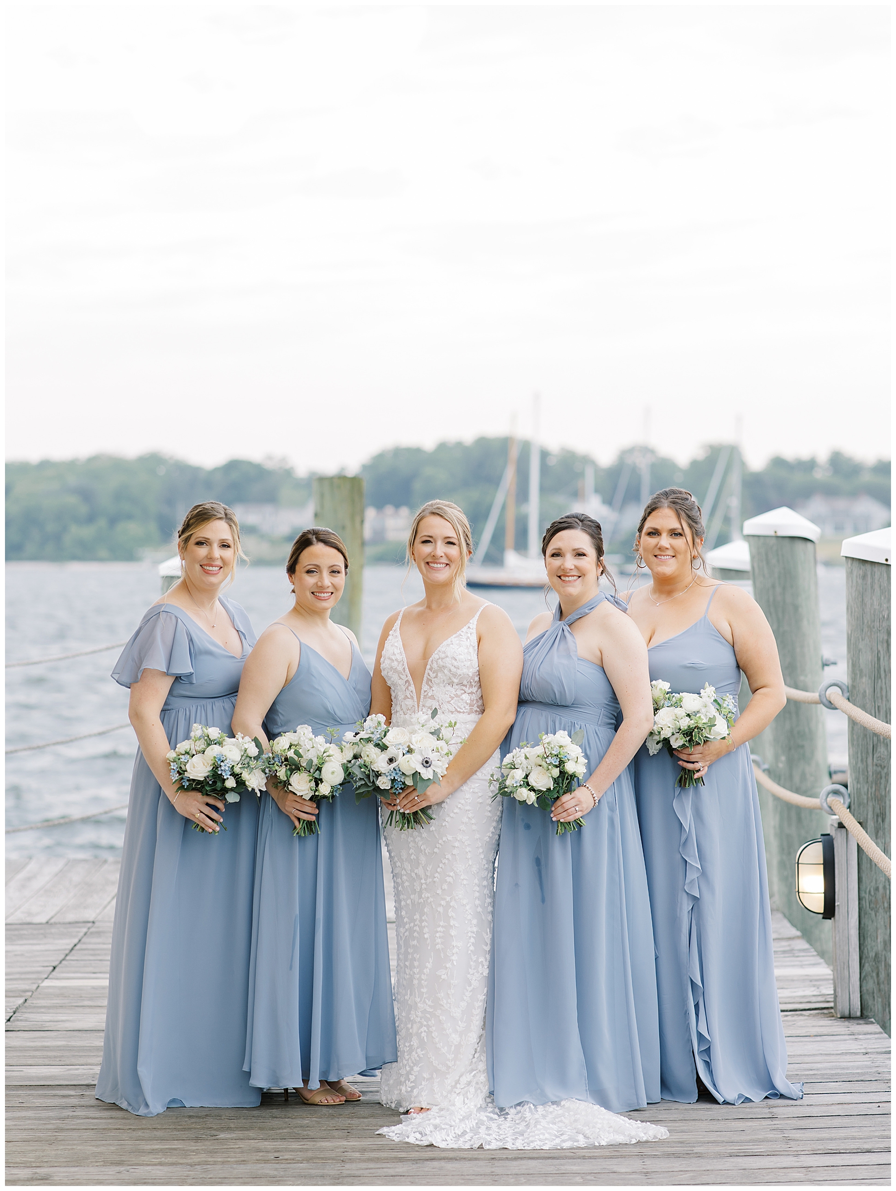 bride with bridesmaids on dock at Bristol Harbor Inn