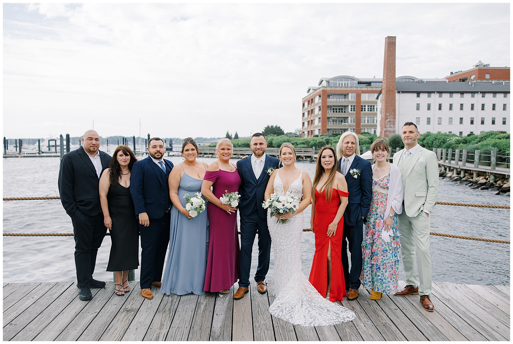 family photos by the water before Bristol Harbor Inn Coastal Wedding