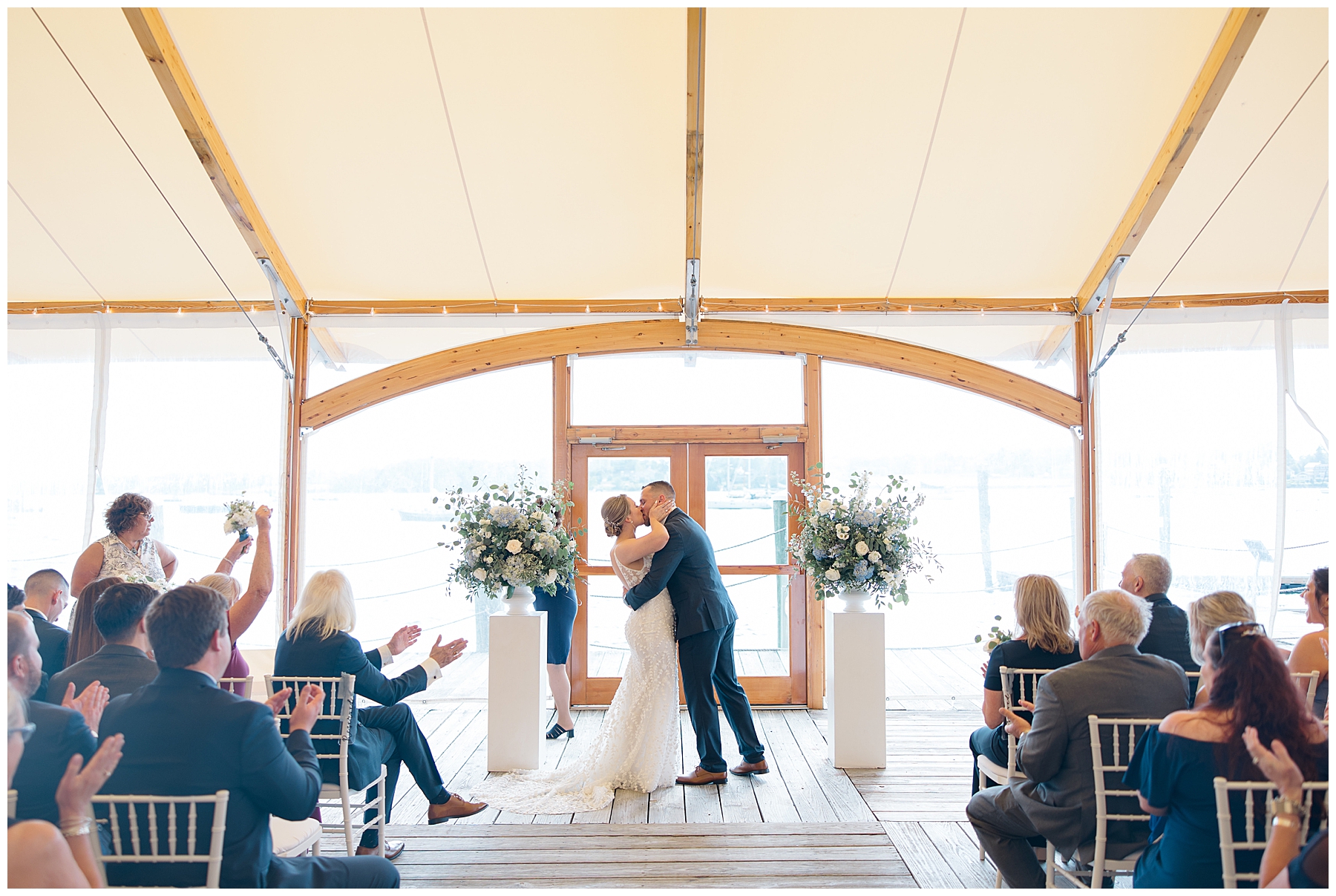 newlyweds kiss at wedding ceremony 