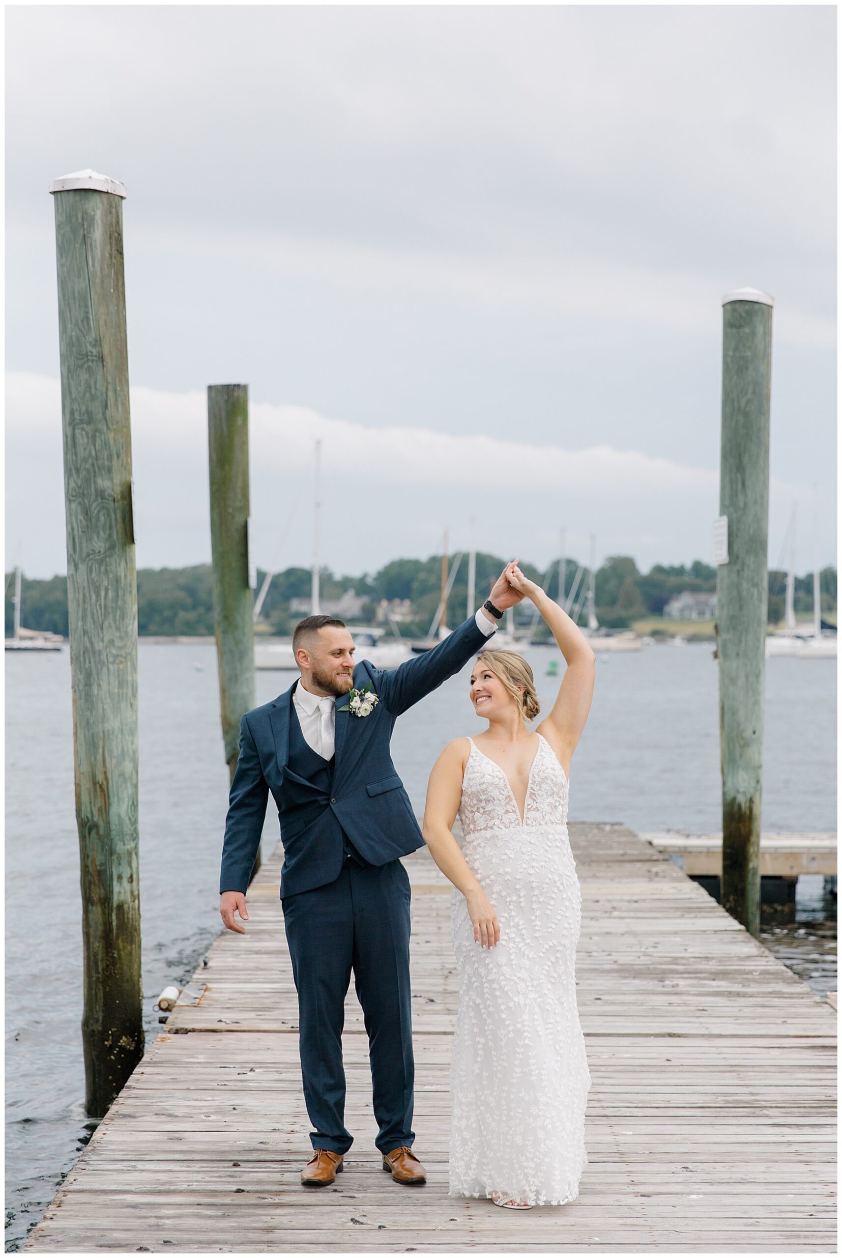 newlyweds dance on the docks from Bristol Harbor Inn Coastal Wedding