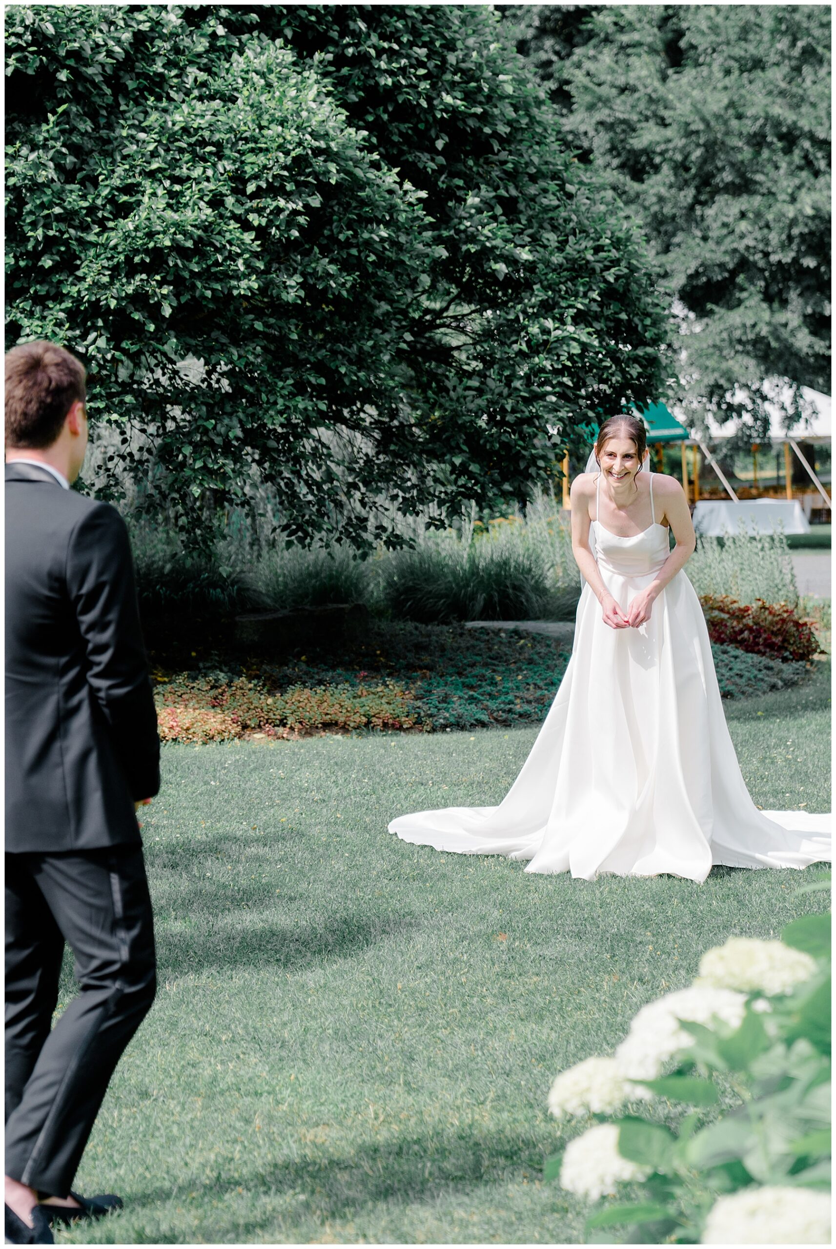 bride and groom reactions during first look