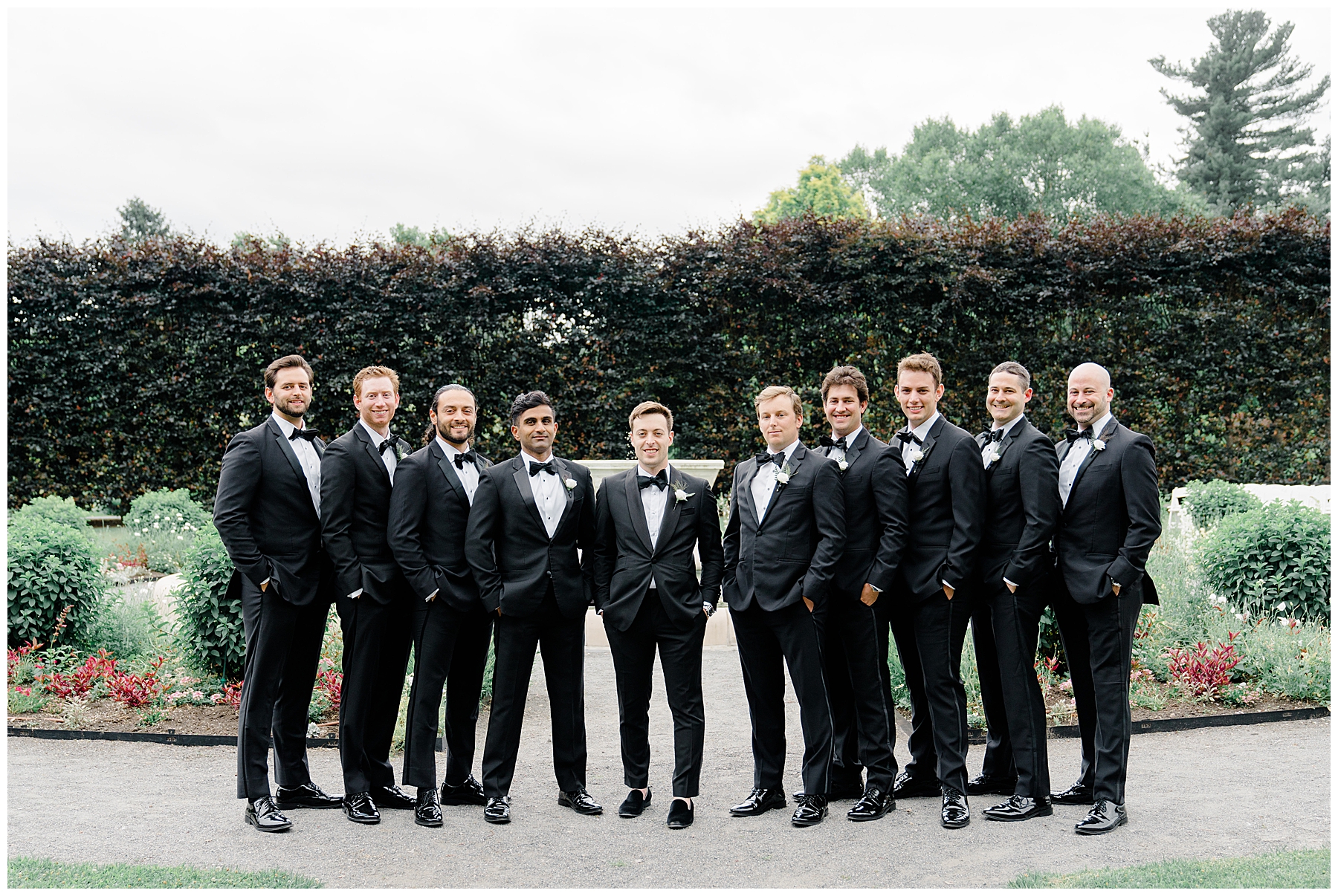 groomsmen and groom