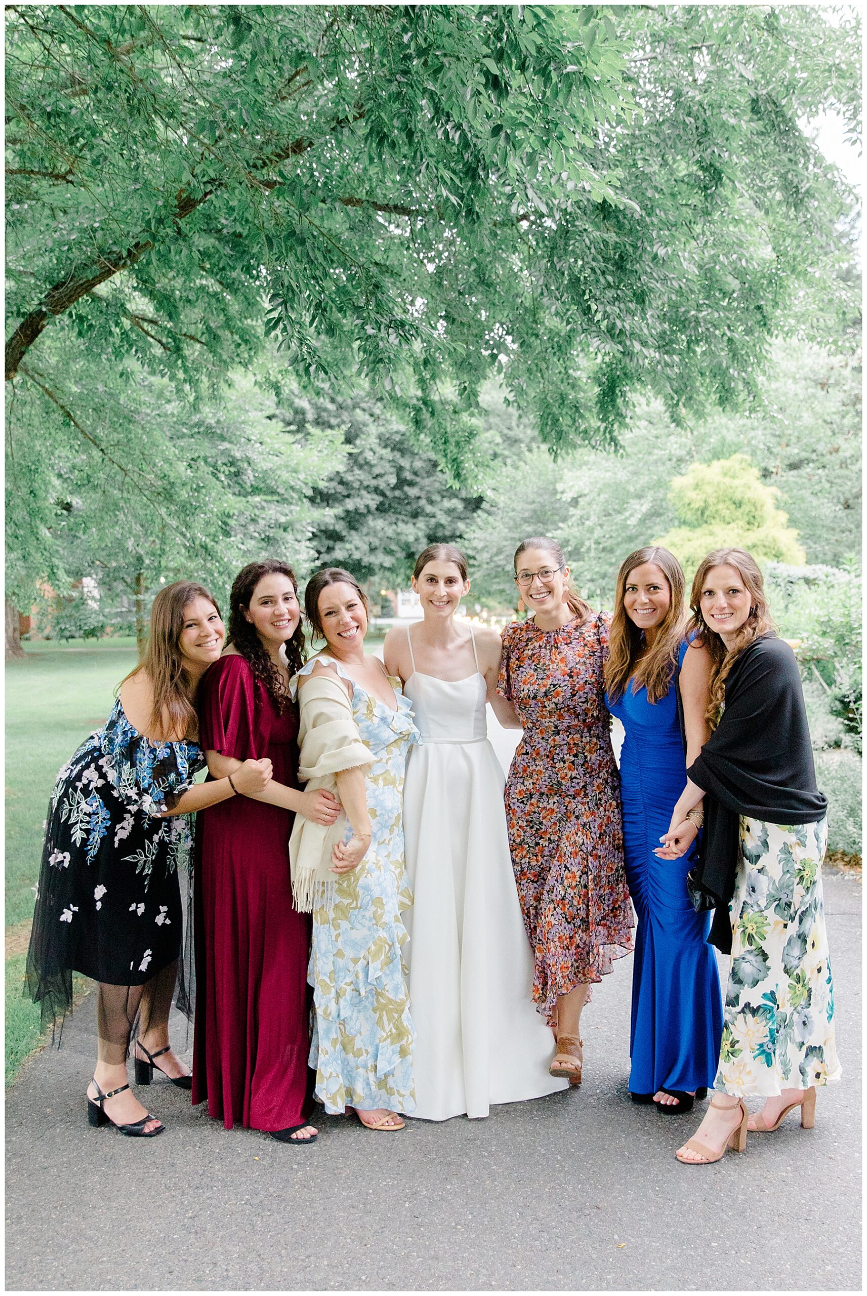 bride stands with friends 