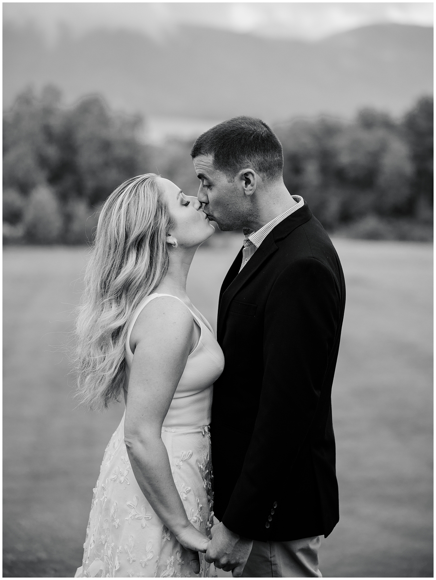 couple kiss at rehearsal dinner