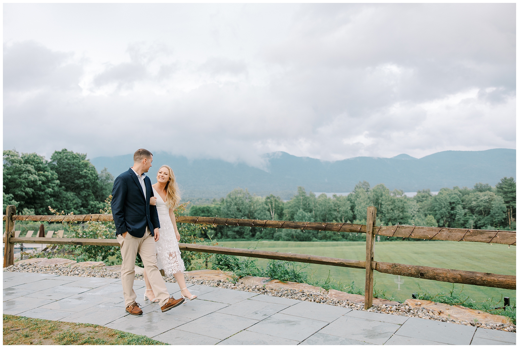 couple walk together the night before their wedding