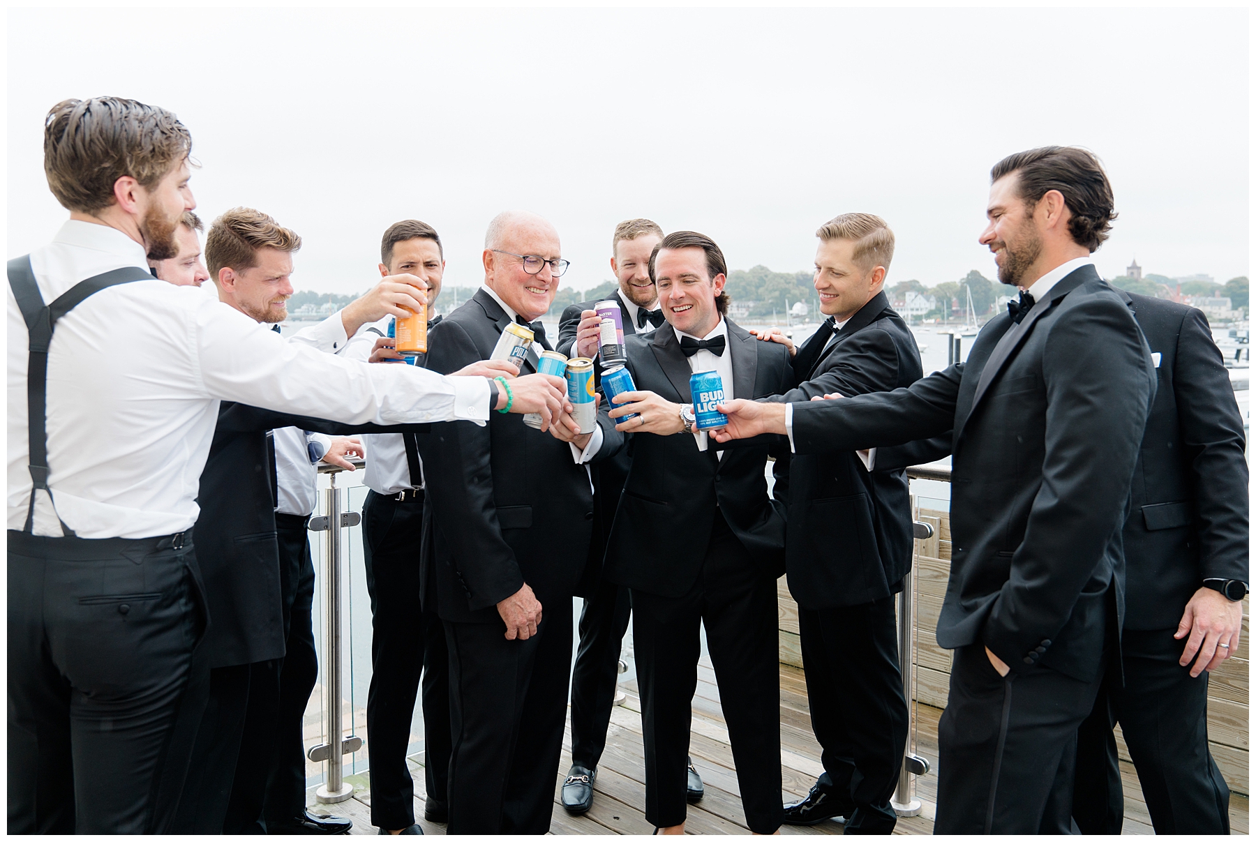 groom + groomsmen toast together