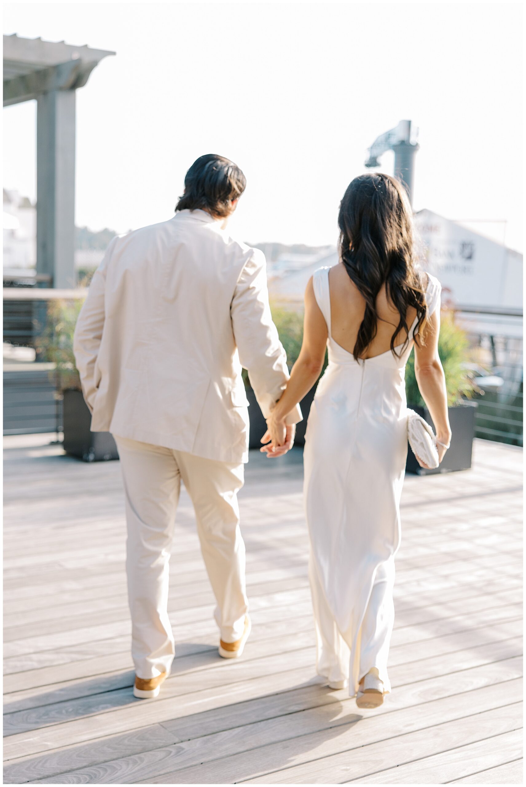 couple hold hands