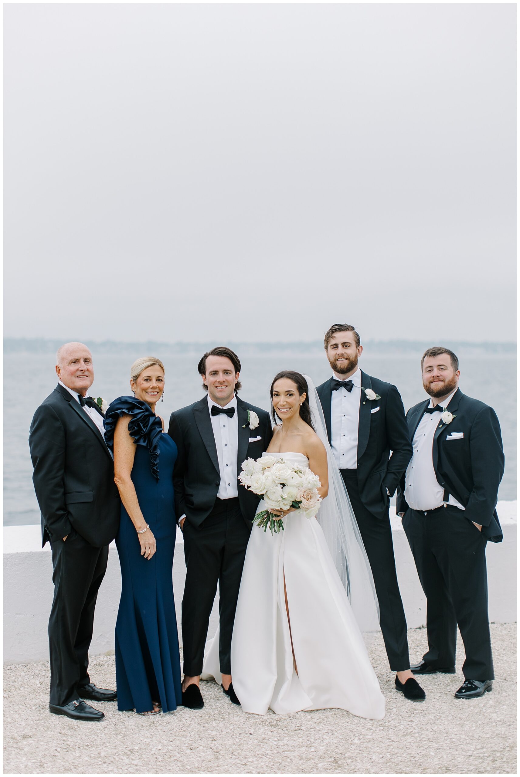 bride and groom with family