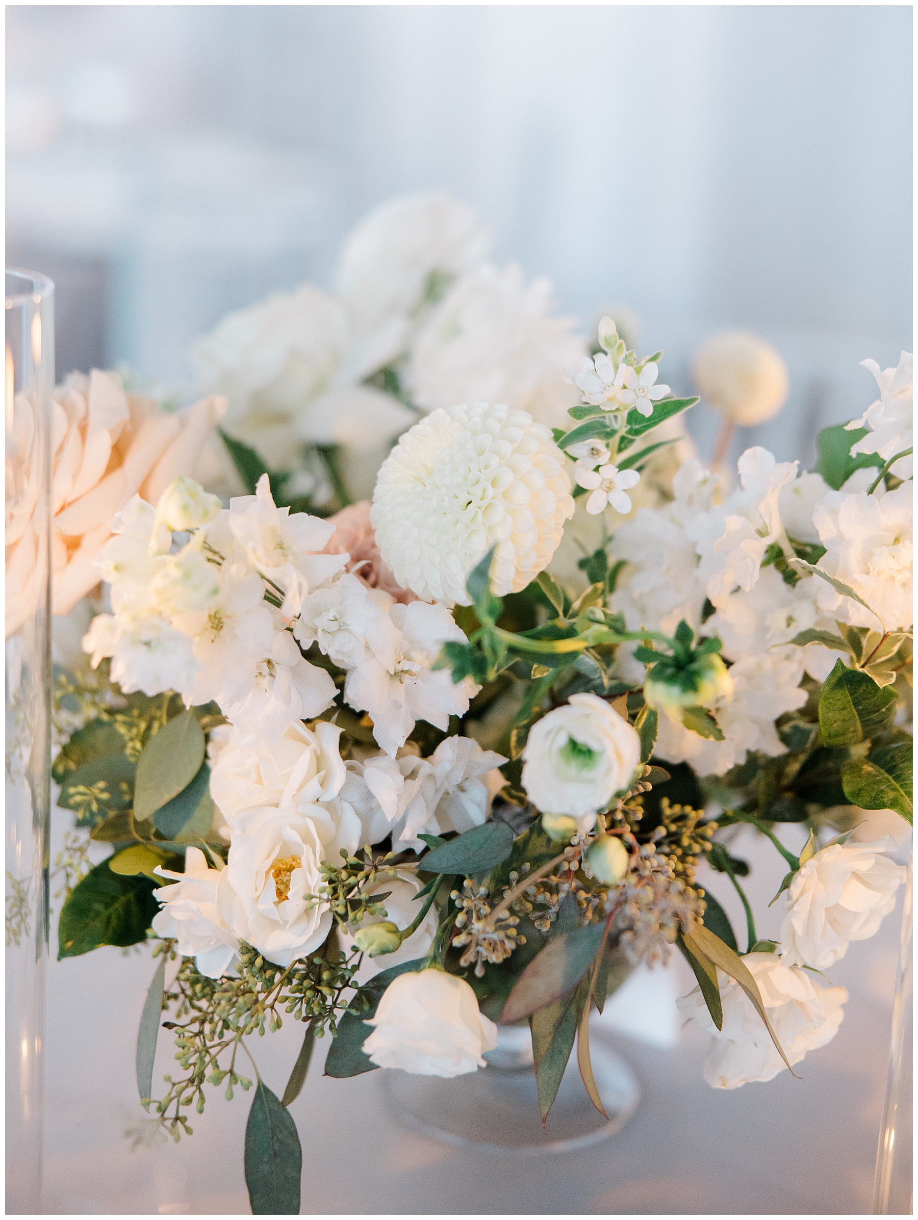 wedding flower arrangements from Coastal Wedding at Belle Mer, a Longwood Venue