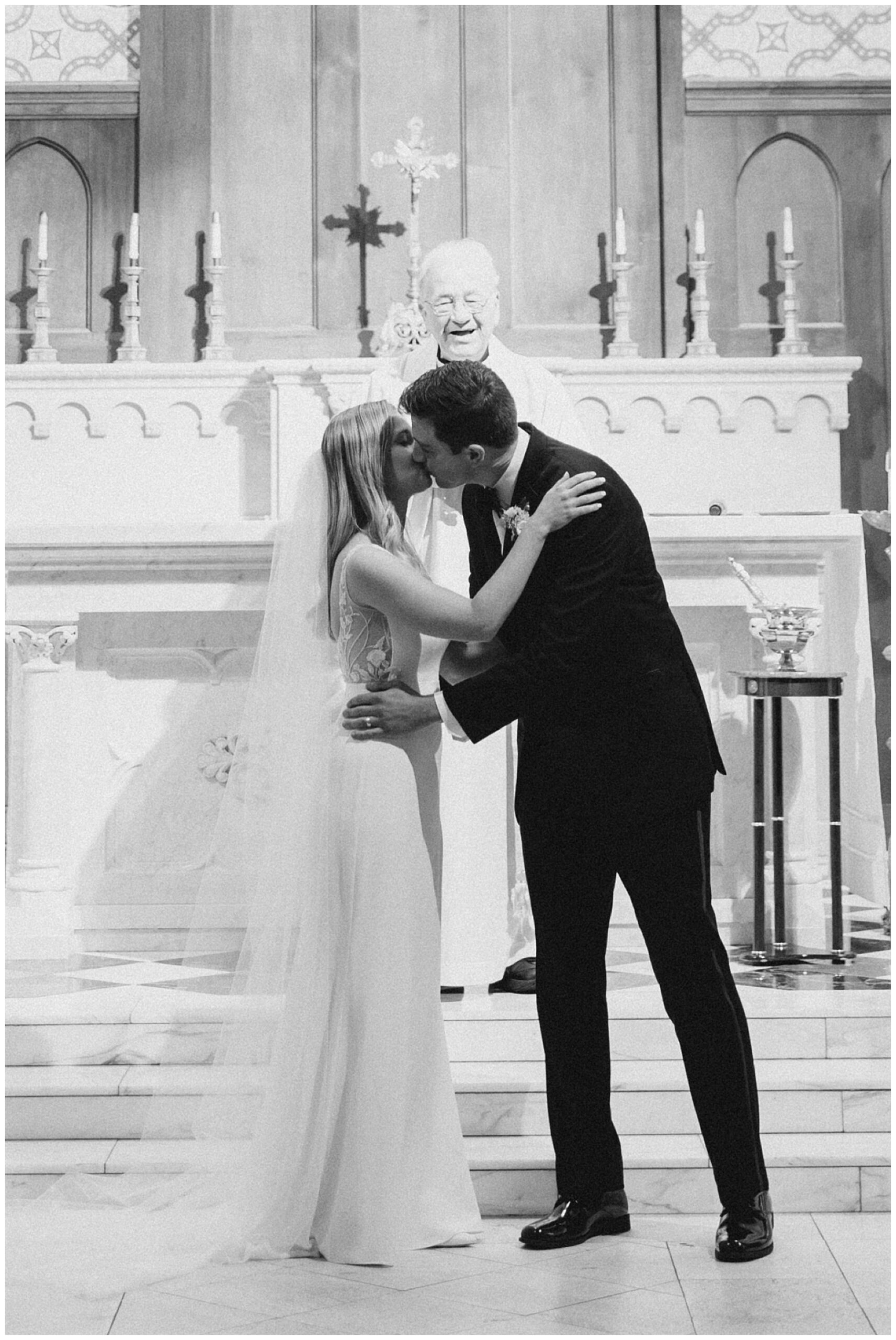 newlyweds kiss as they are pronounced husband and wife