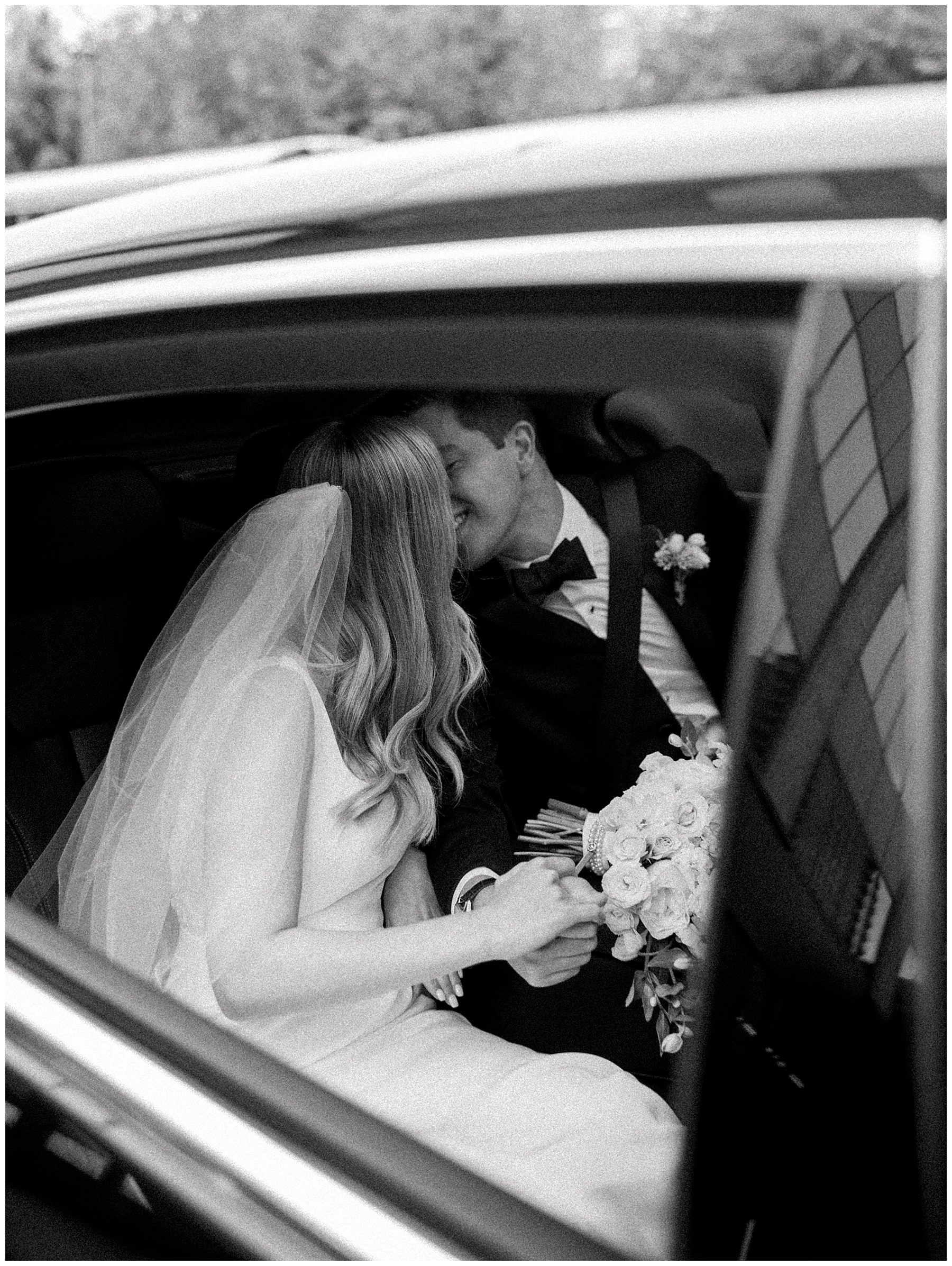 newlyweds in getaway car