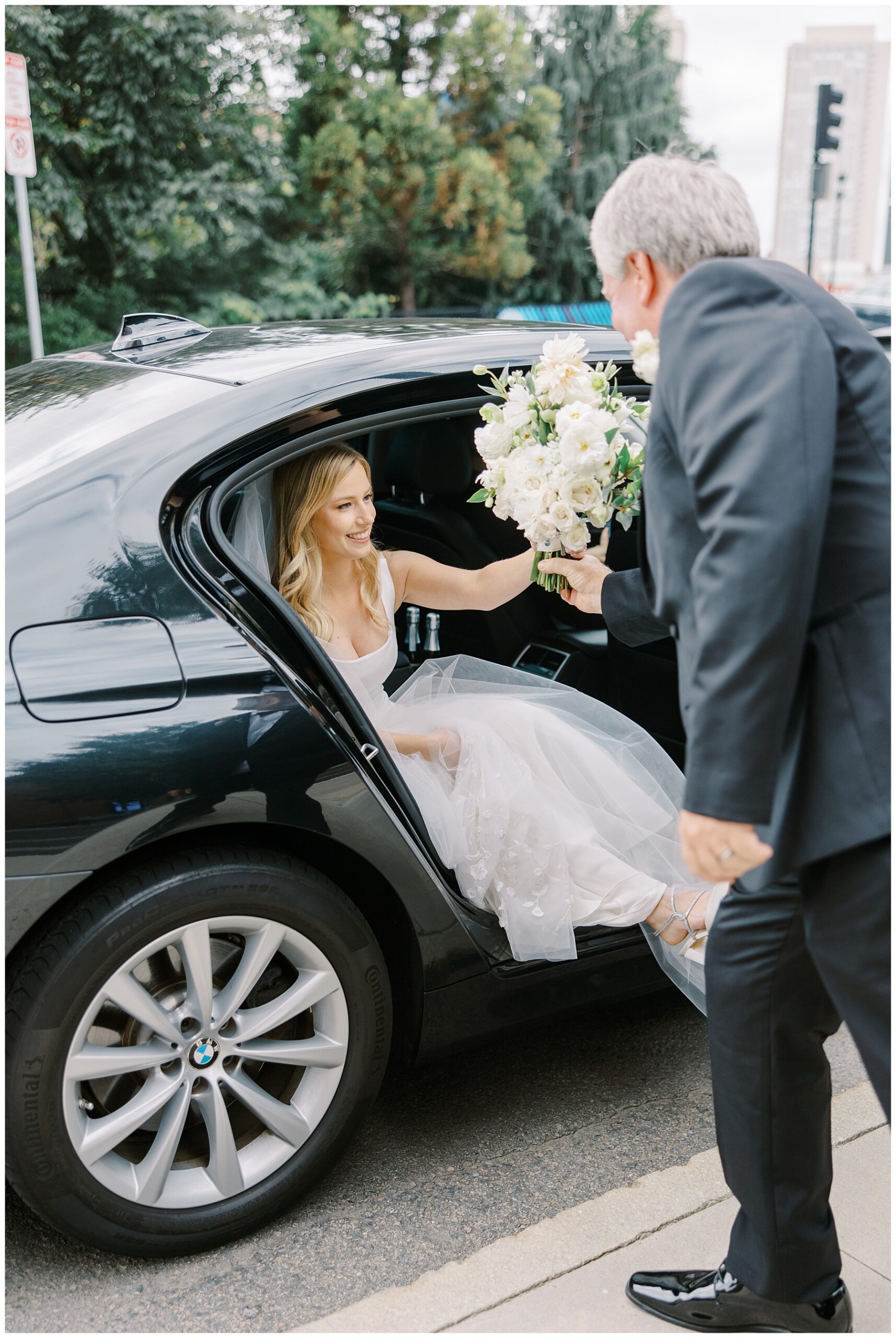 dad helps bride out of car at church