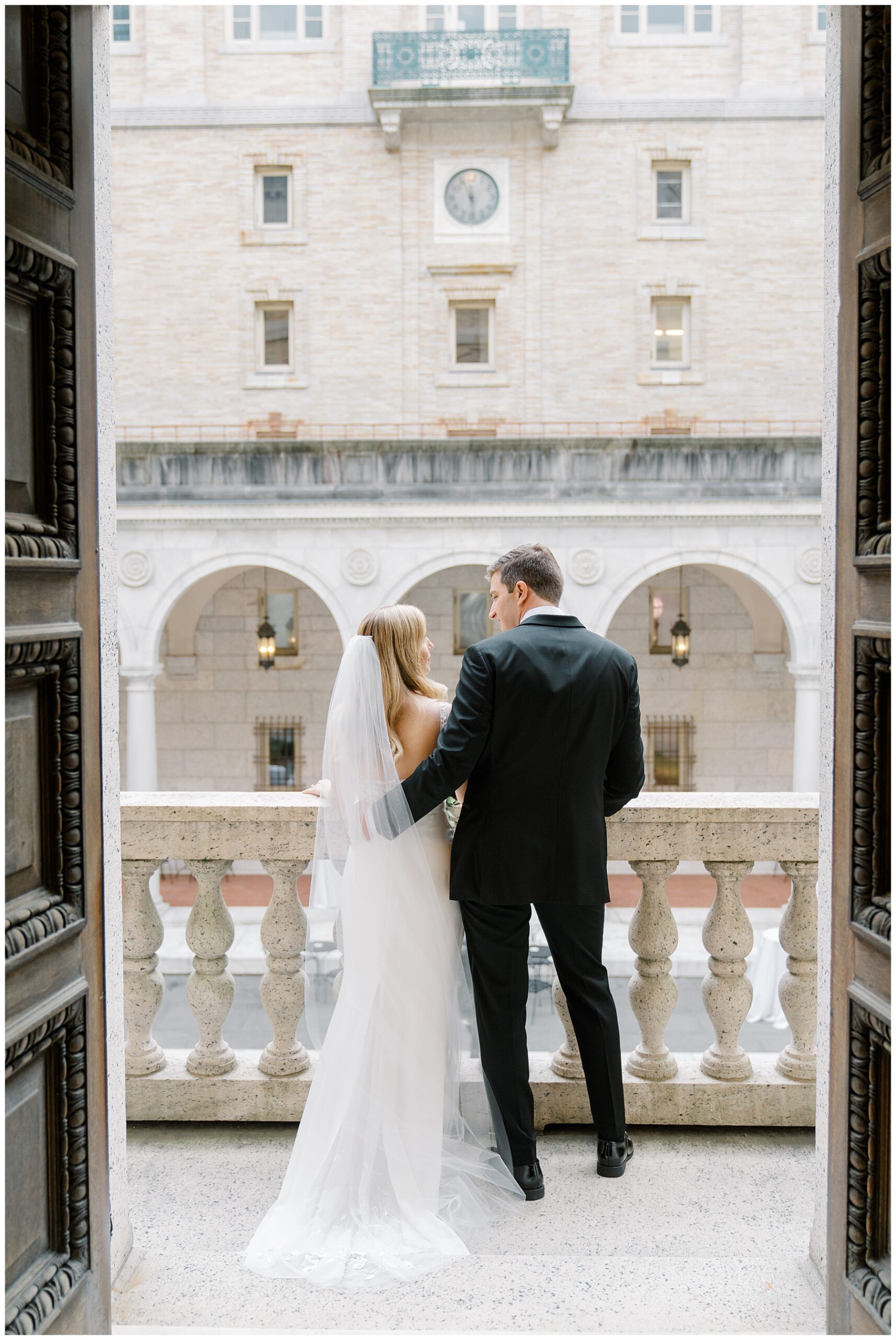 newlyweds on balcony