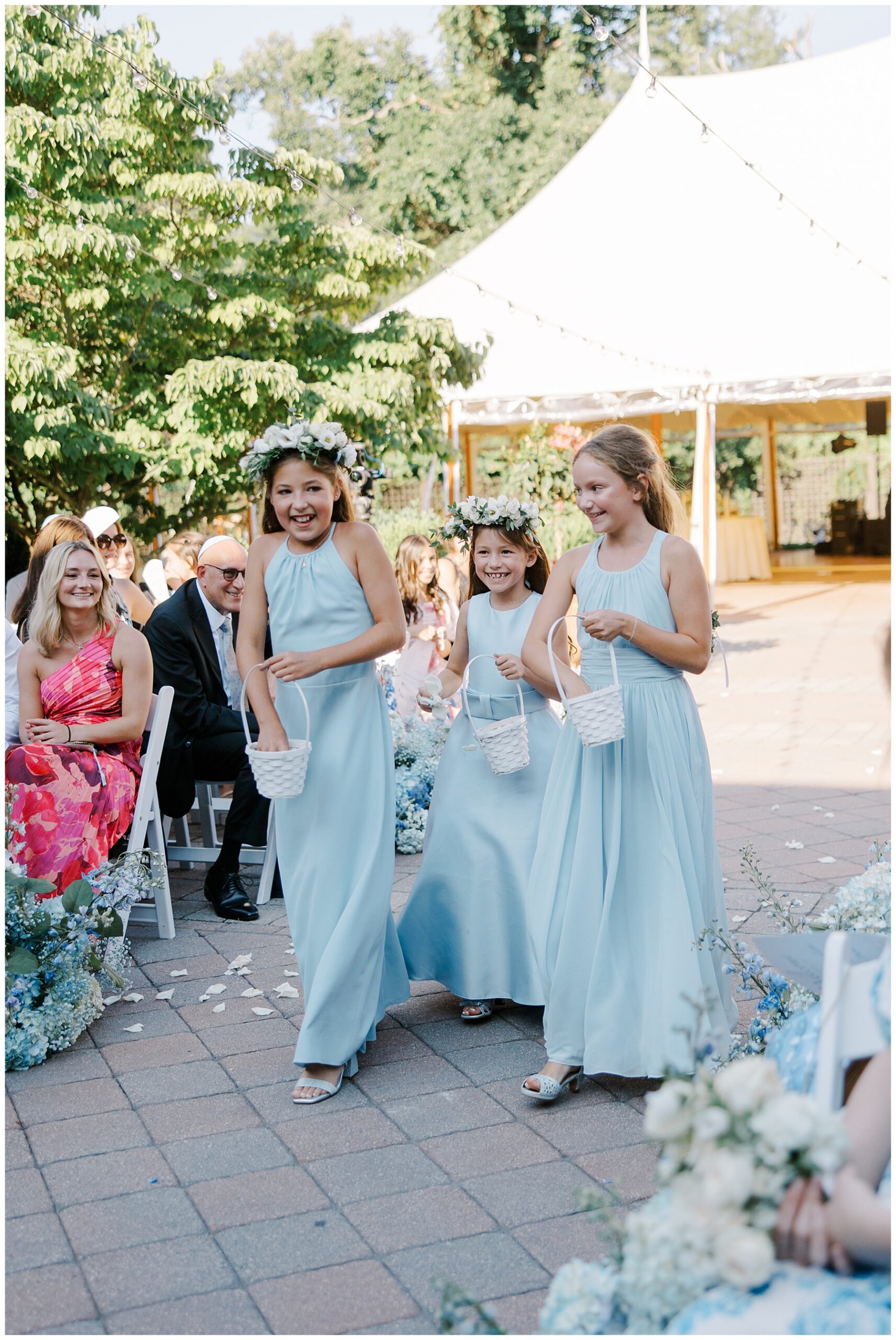 flower girls walking down aisle 