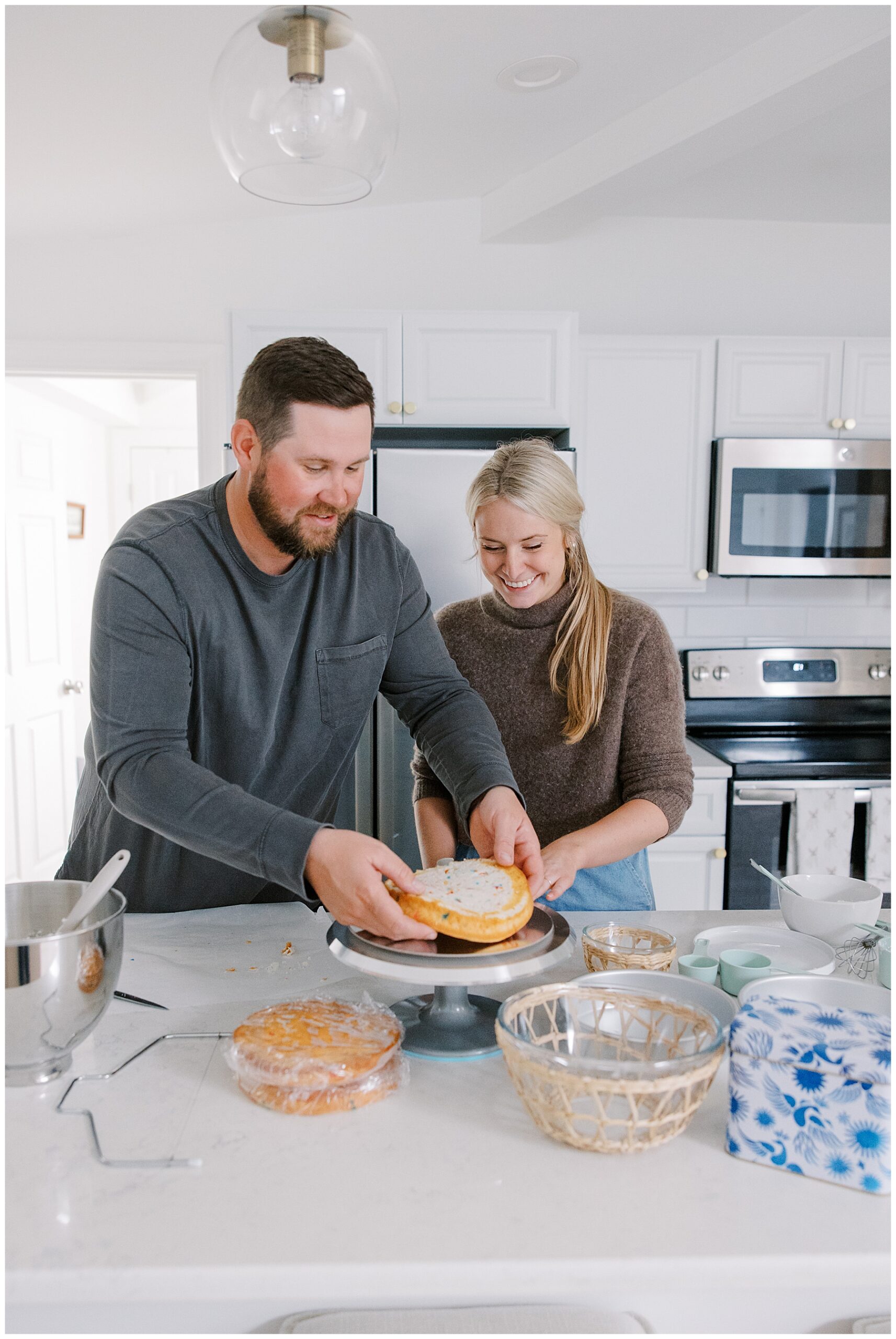 Candid At-Home Engagement Photoshoot of cake-baking session