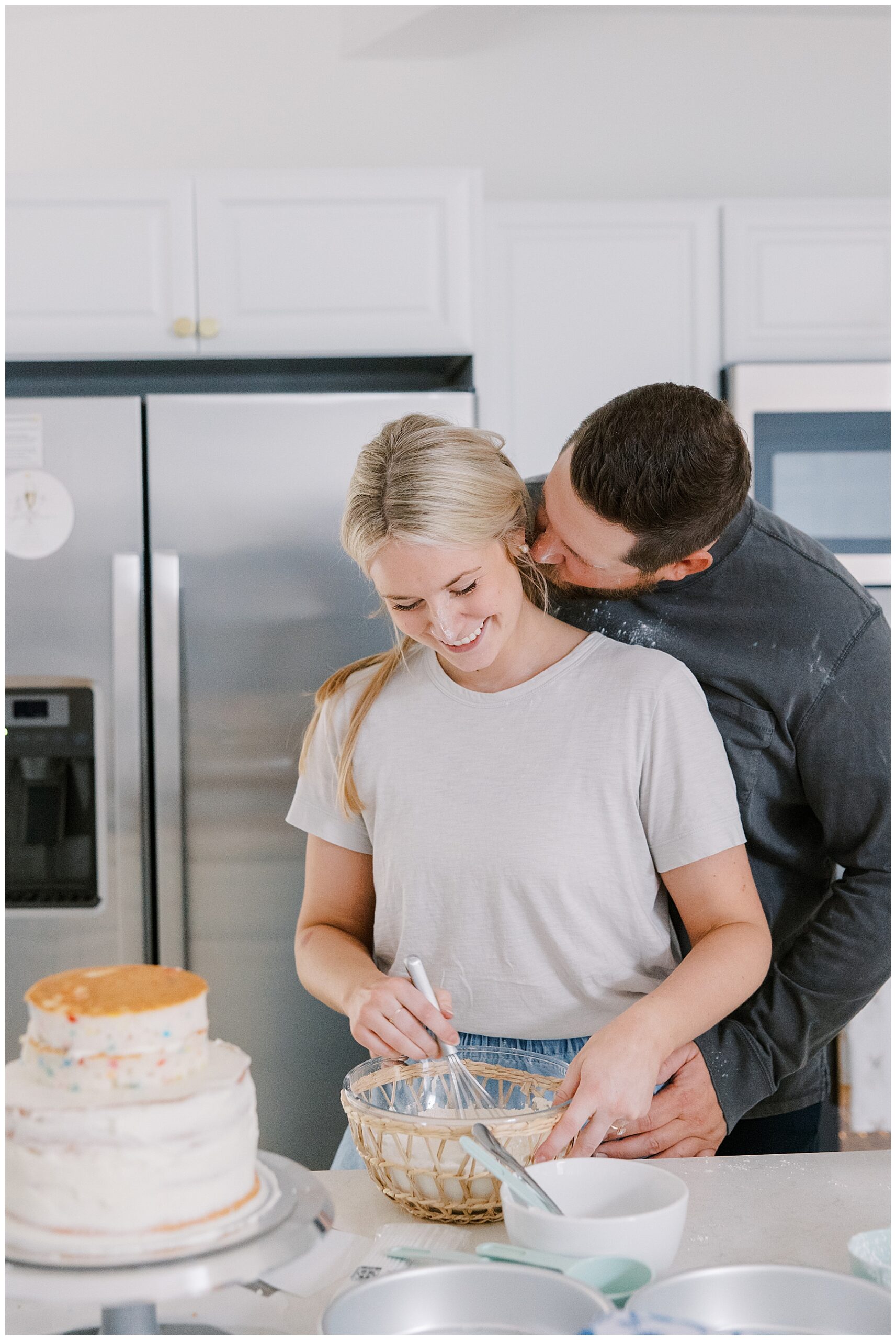 guy kisses fiance's cheek