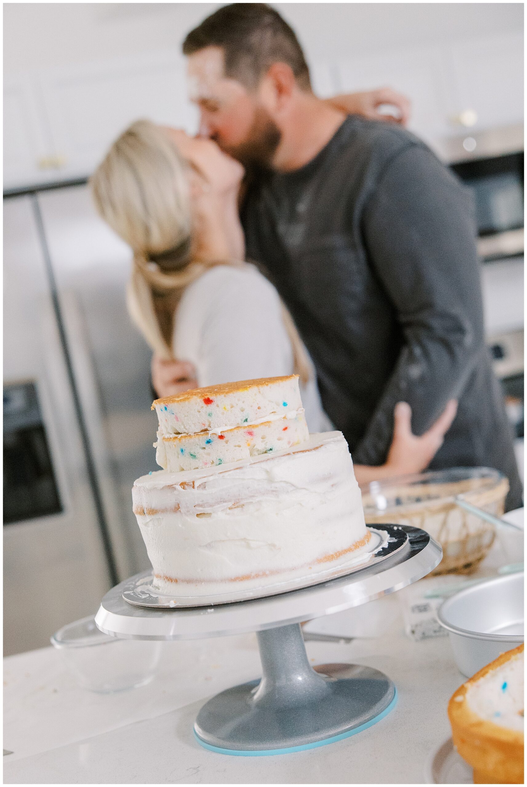 Candid At-Home Engagement Photoshoot of couple baking cake together