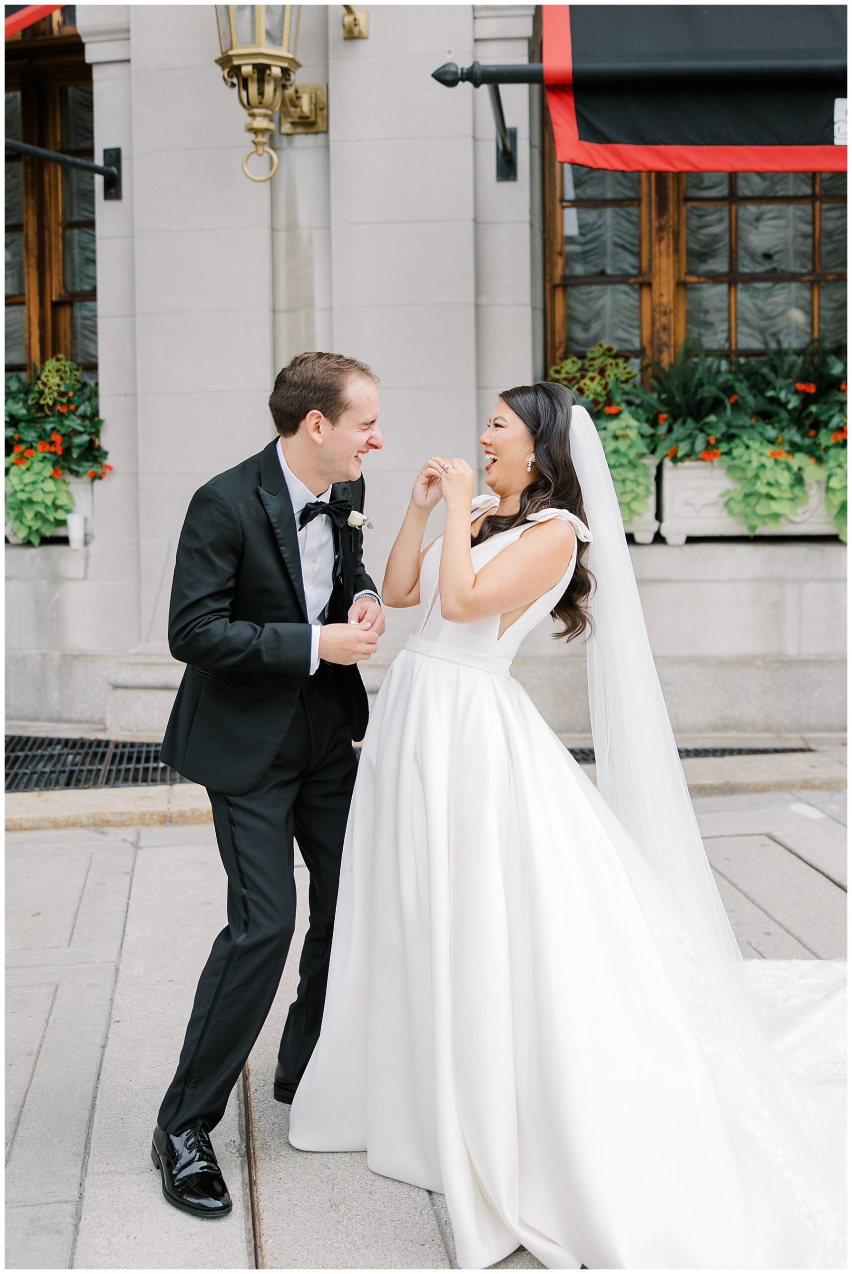candid first look photos outside of Fairmont Copley Plaza Hotel in Boston, MA