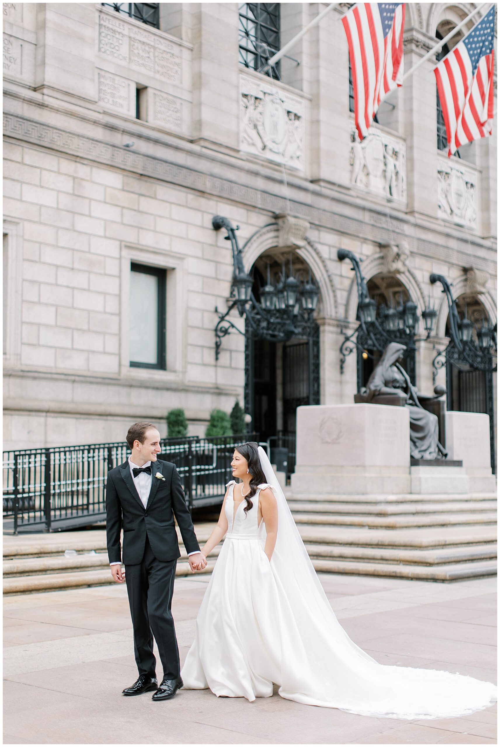 bride and groom outside of the Boston Public Library
