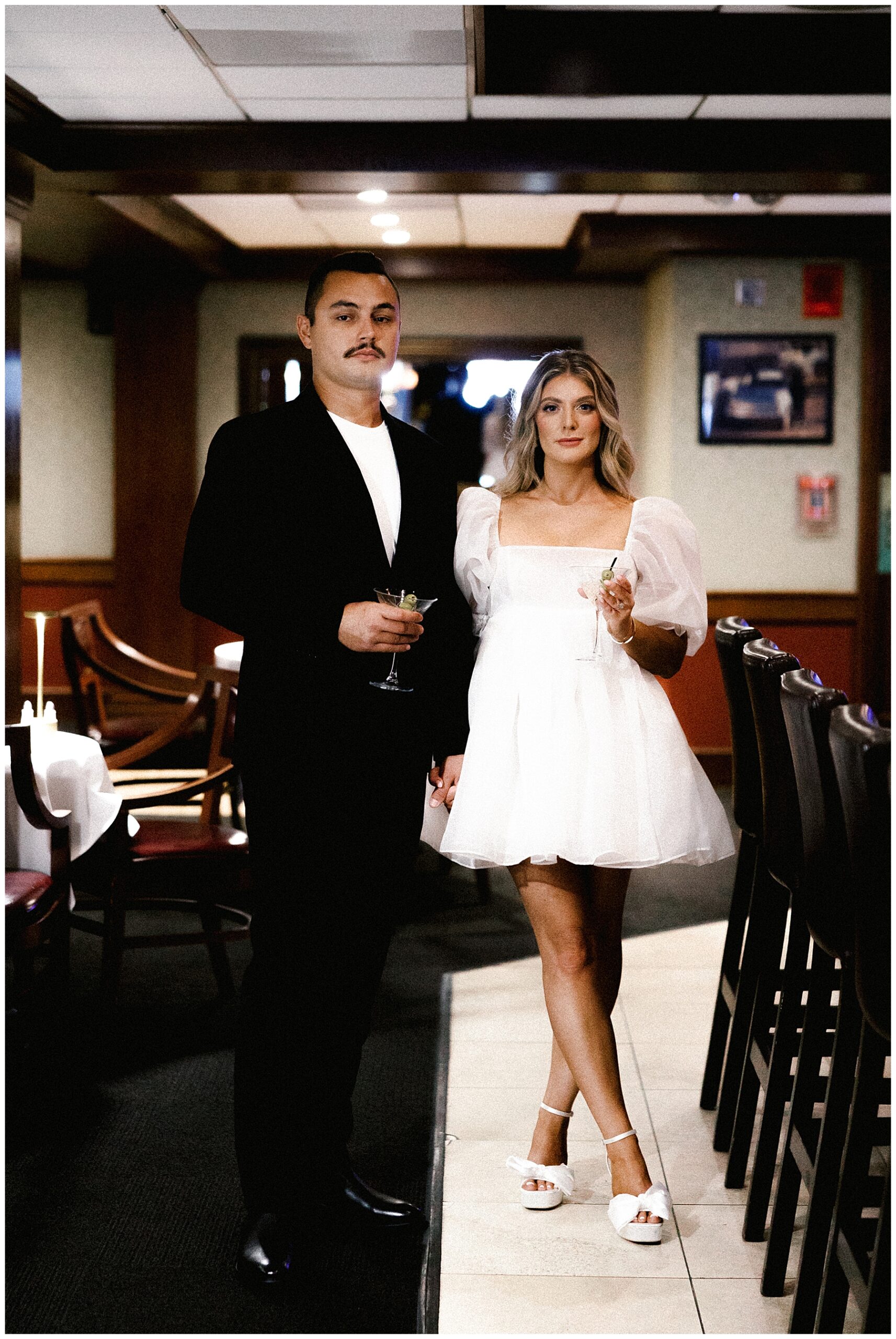 couple walk through restaurant