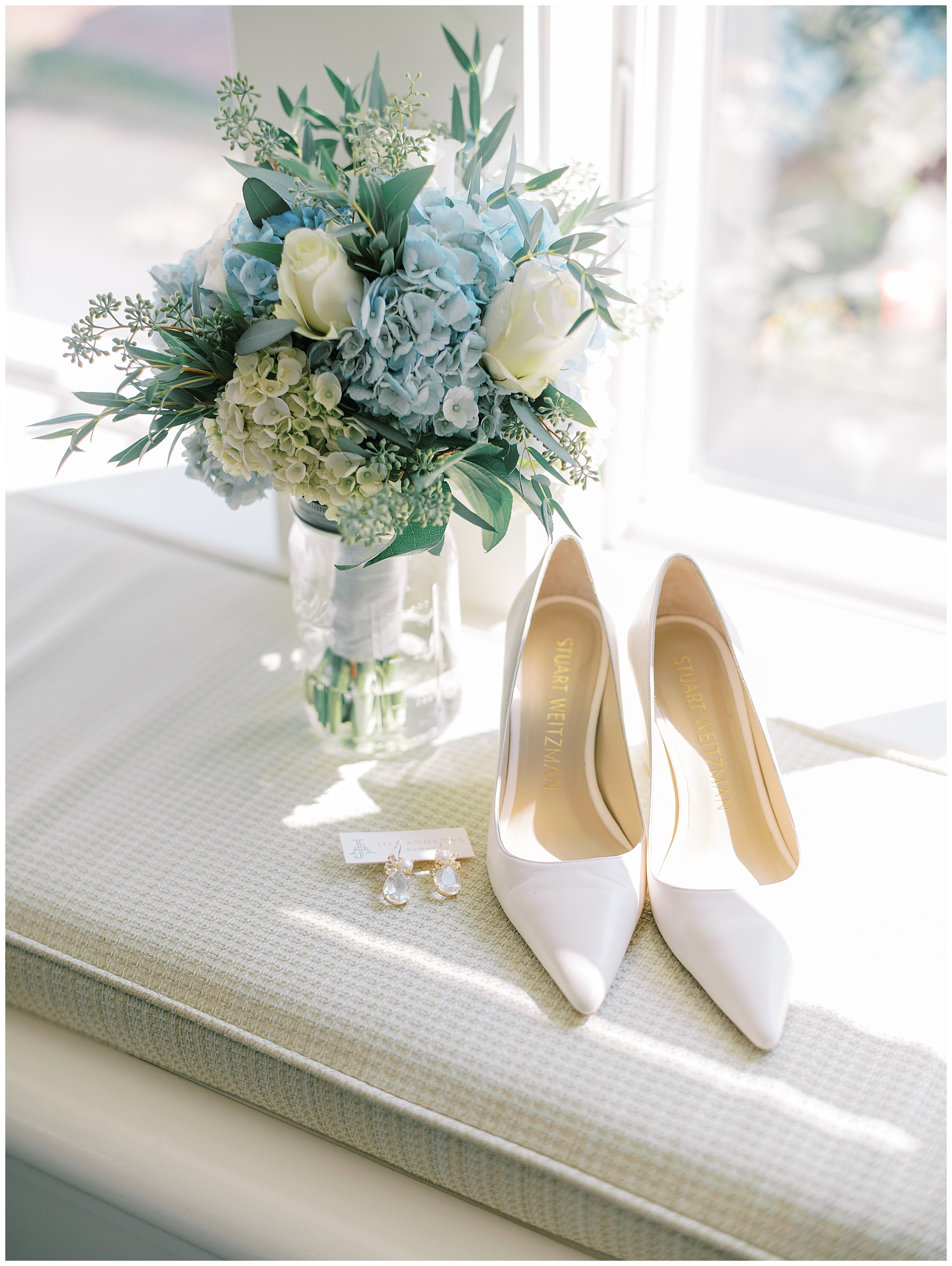 bride's wedding shoes and bouquet