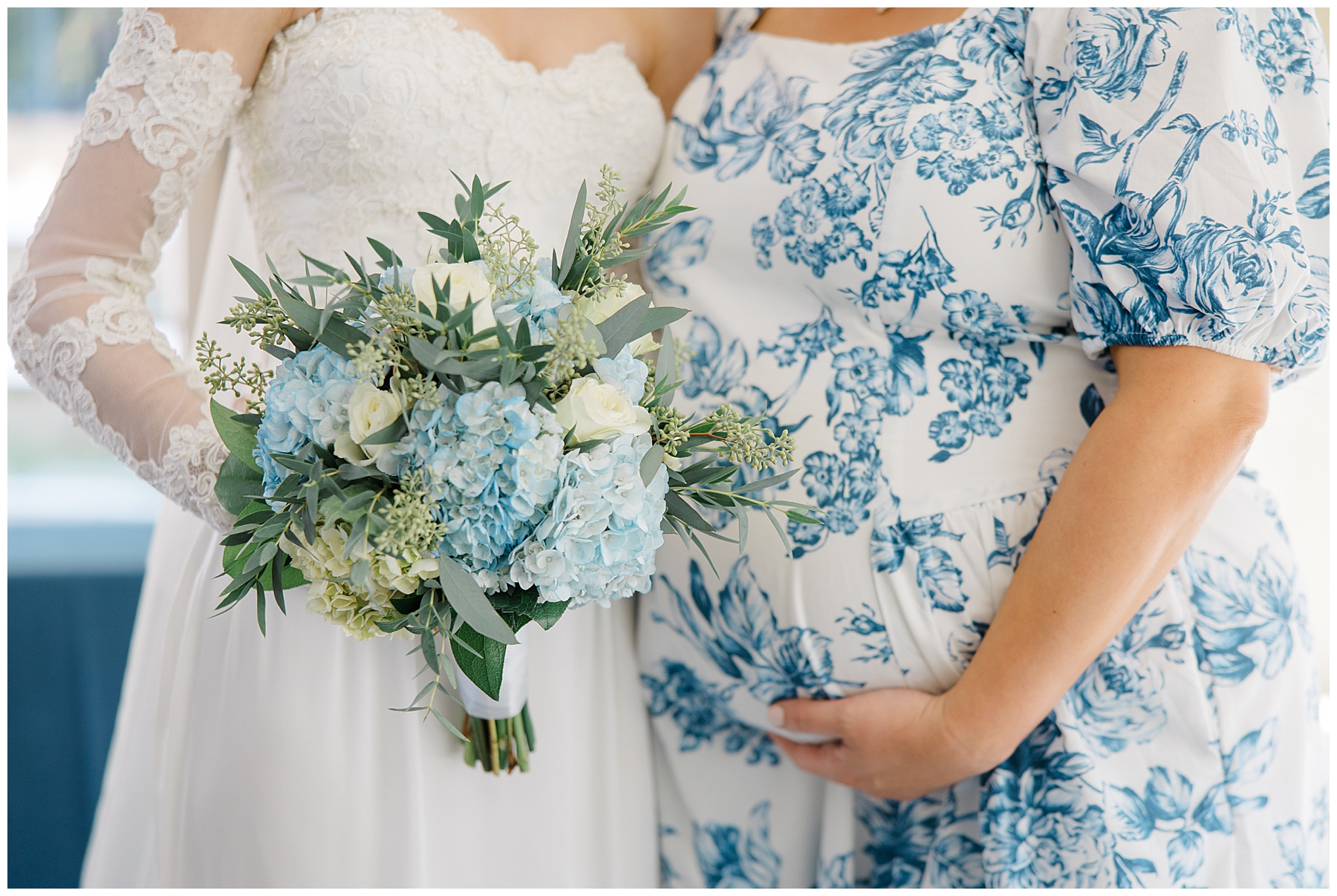 bride with sister who is pregnant