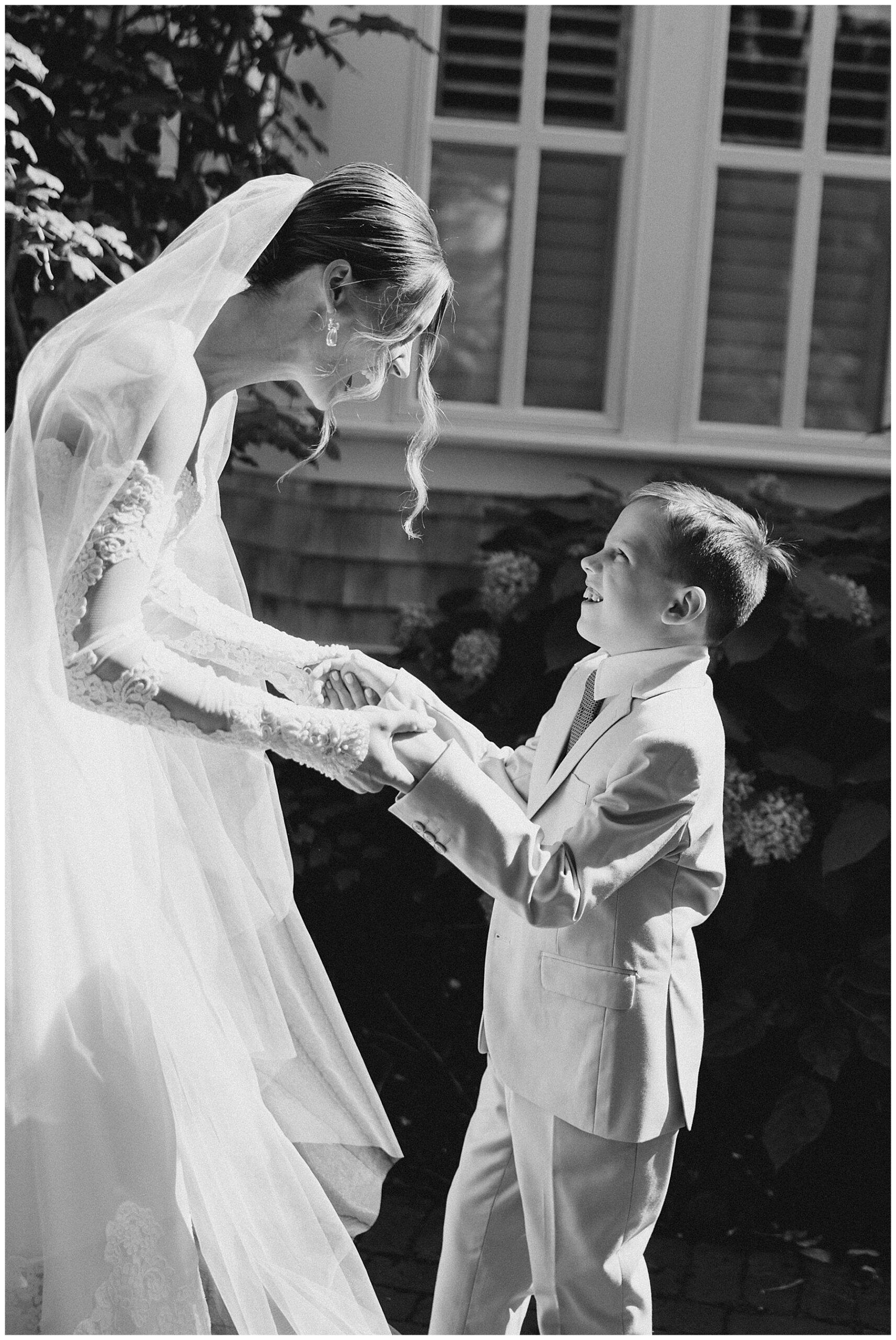 touching first look moment between bride and her young son