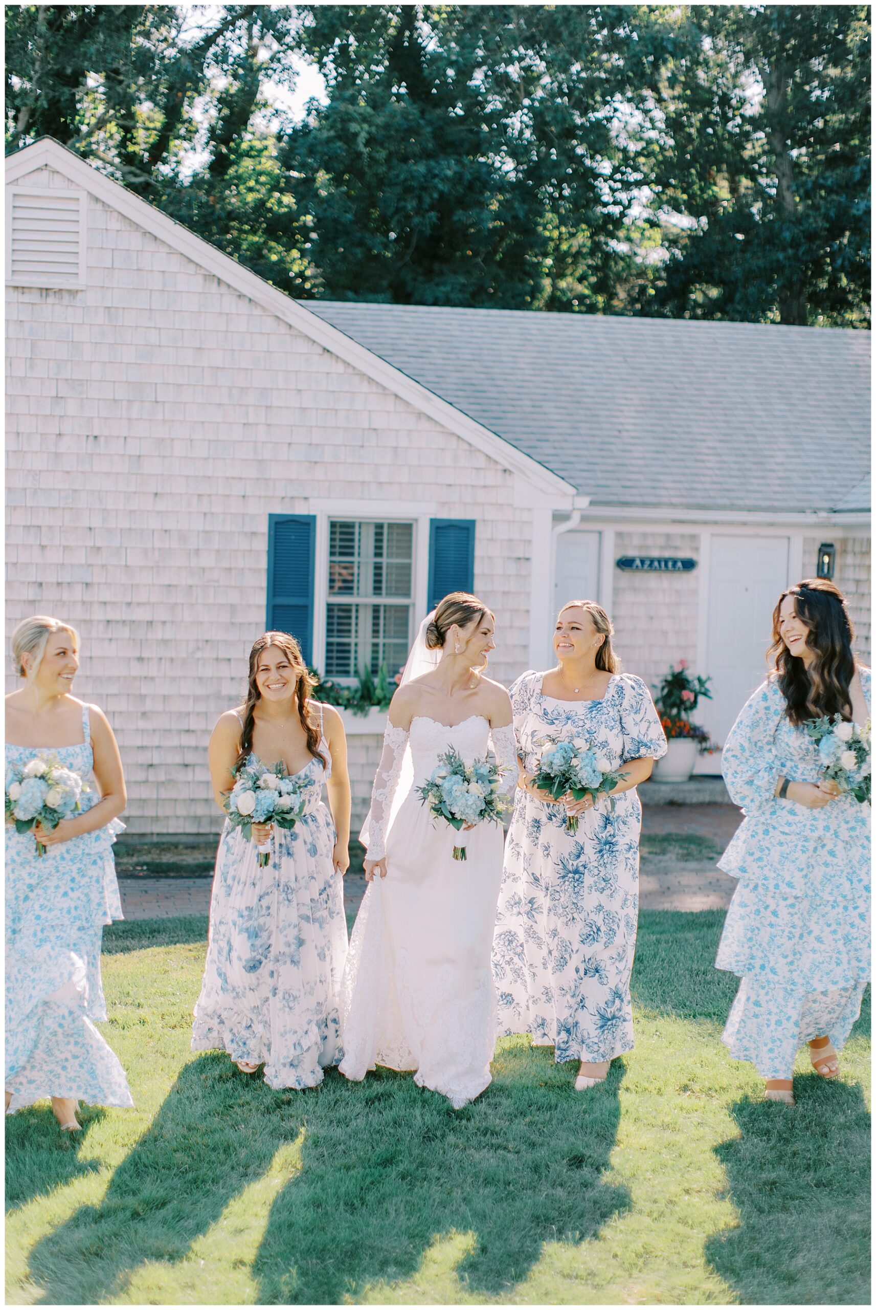bride walks with bridesmaids
