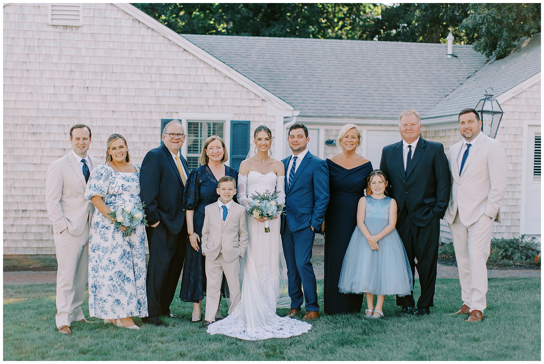 bride and groom with family