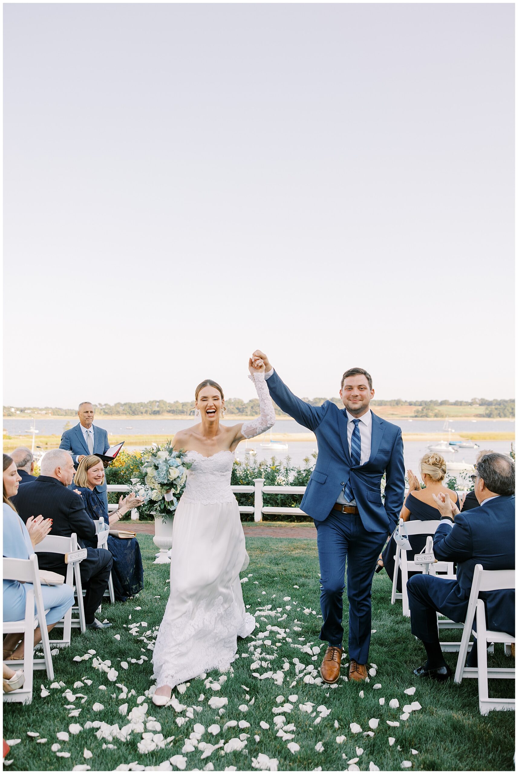 Joyful newlyweds celebrate as they walk down the aisle