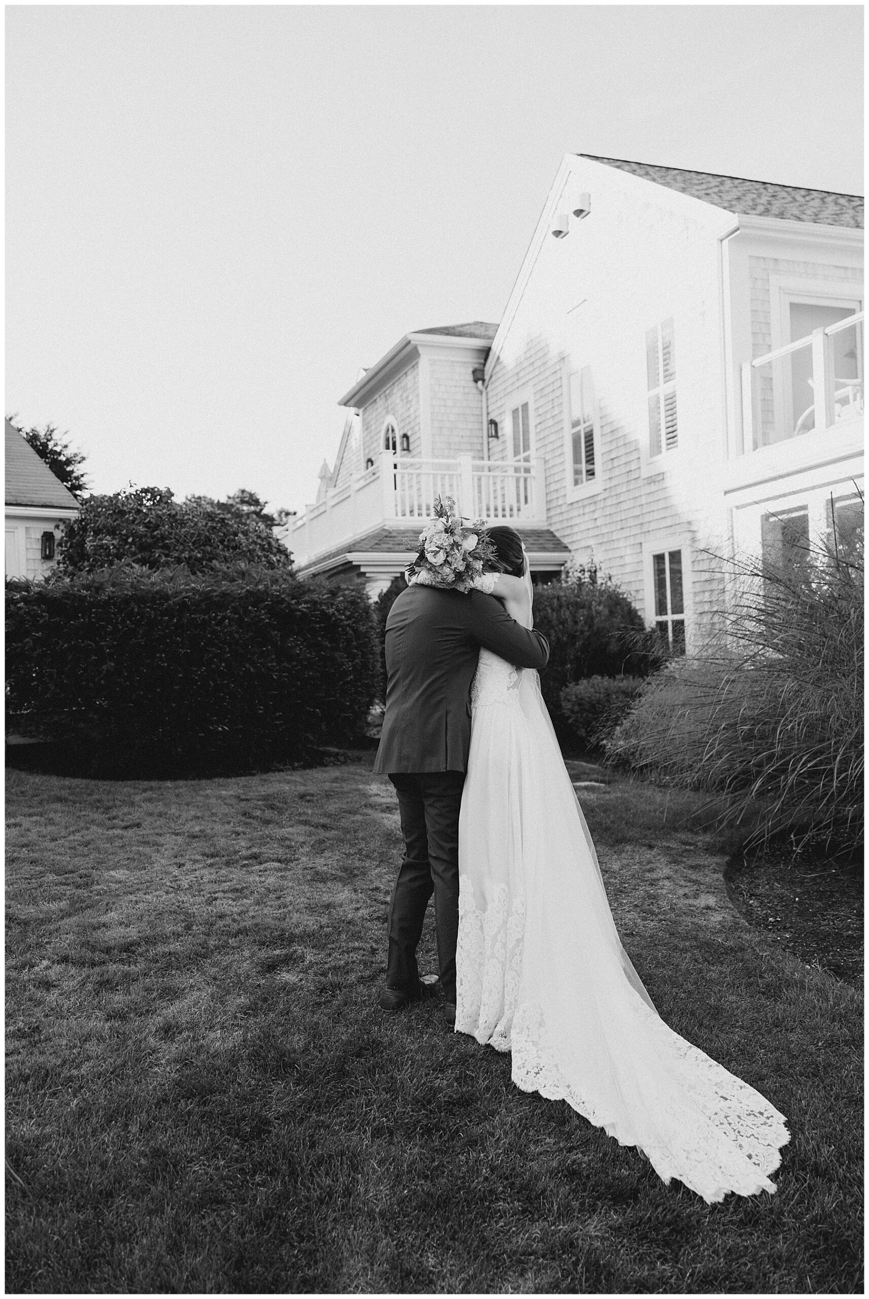 newlyweds hug after ceremony