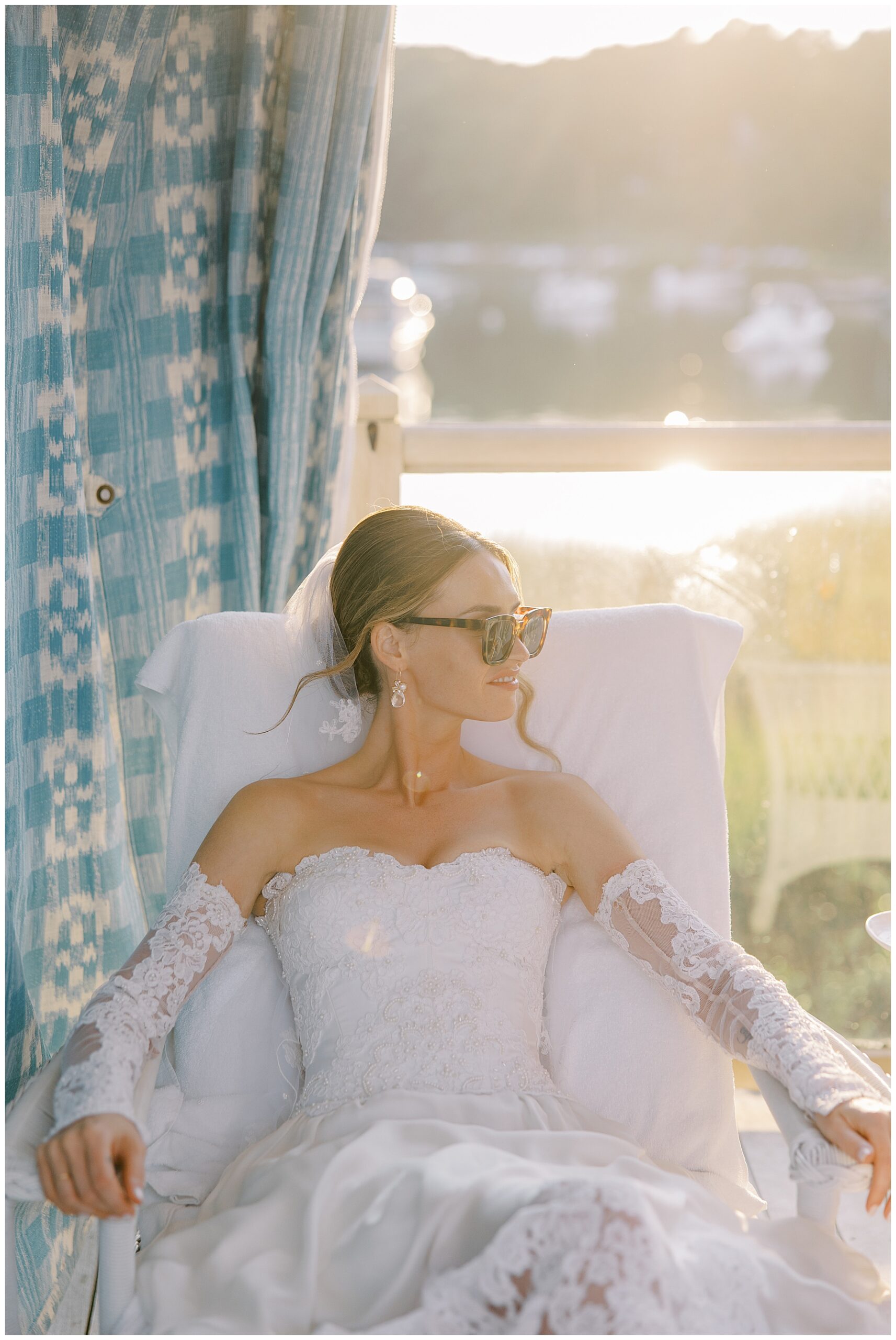 Chic bride lounging in chair and wearing sunglasses