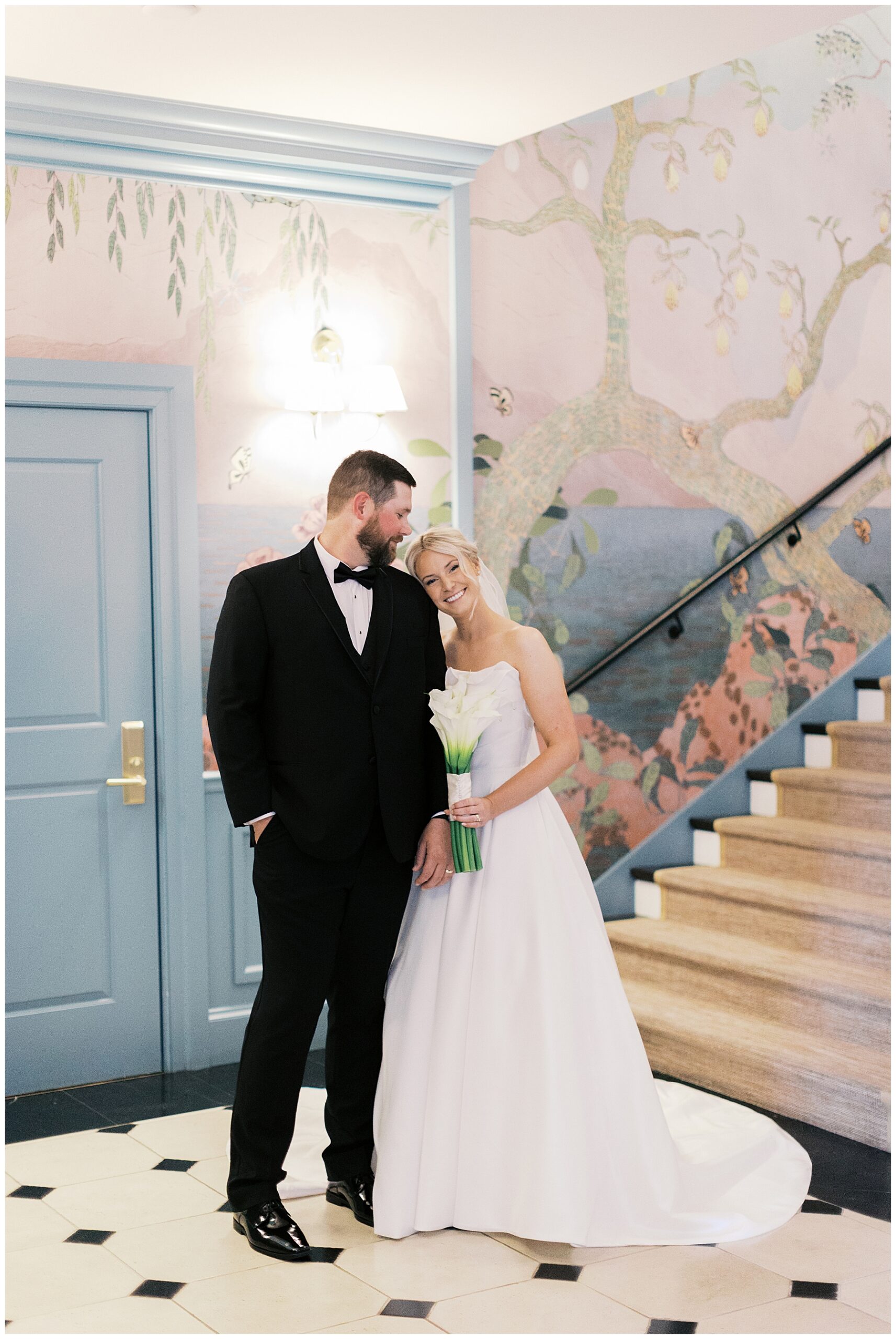 bride lays head on groom's shoulder