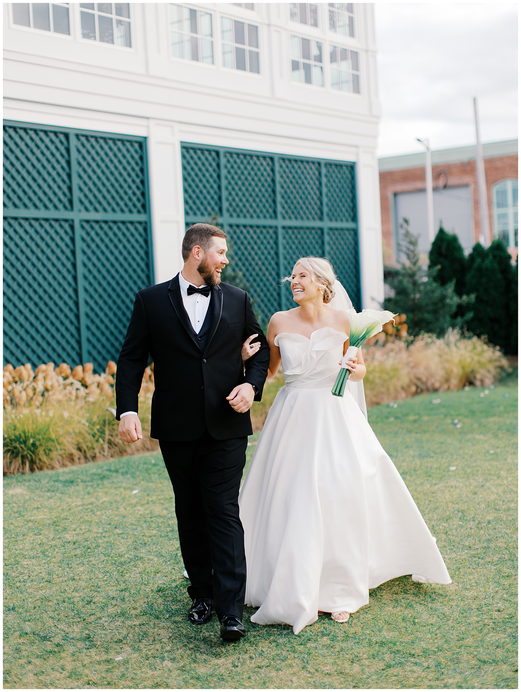 couple walk across property at Gardiner House